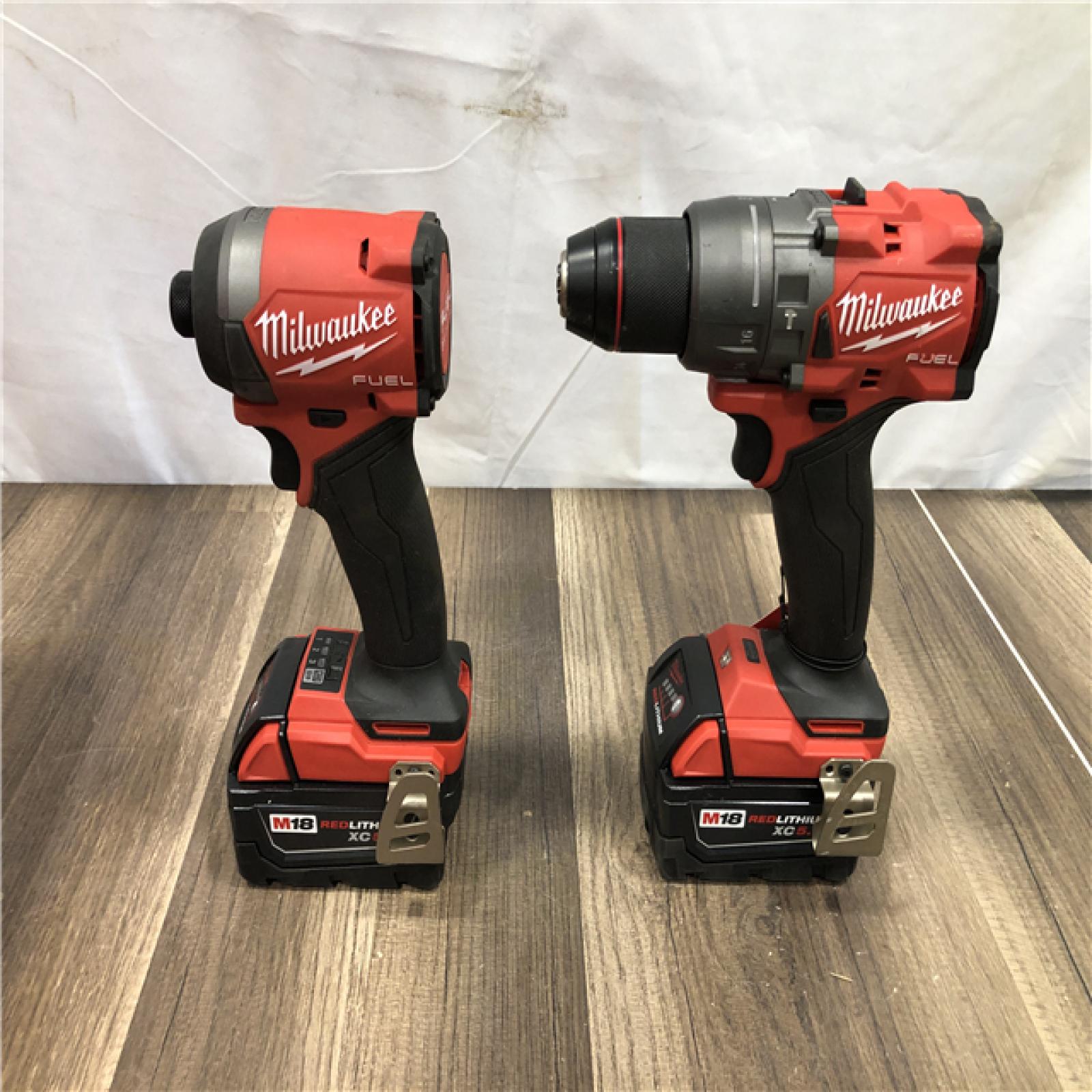 AS-IS Milwaukee FUEL 18V Lithium-Ion Brushless Cordless Hammer Drill and Impact Driver Combo Kit
