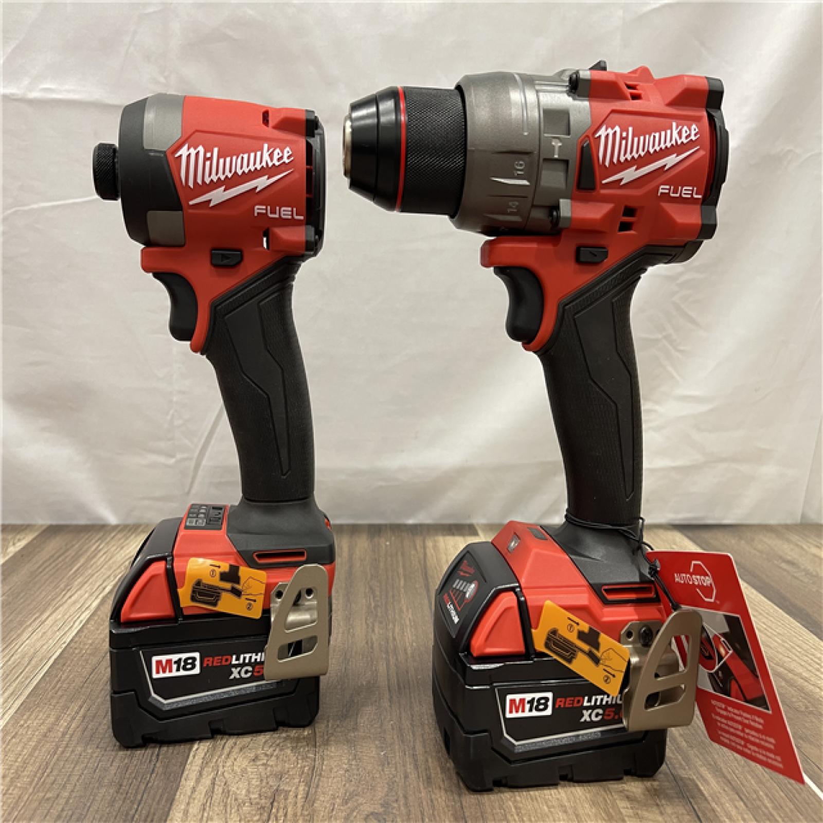 AS-IS Milwaukee M18 FUEL 18V Lithium-Ion Brushless Cordless Hammer Drill and Impact Driver Combo Kit