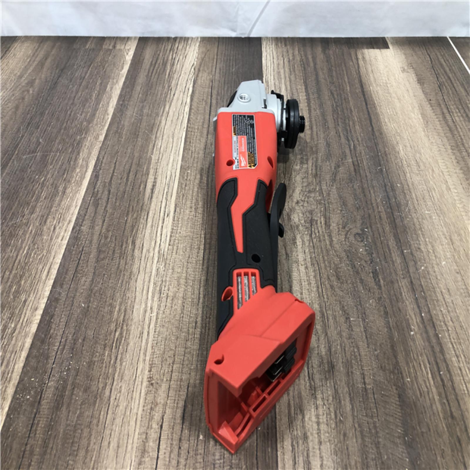 AS-IS Milwaukee 18V Lithium-Ion Brushless Cordless 4-1/2 in./5 in. Grinder w/Paddle Switch (Tool-Only)