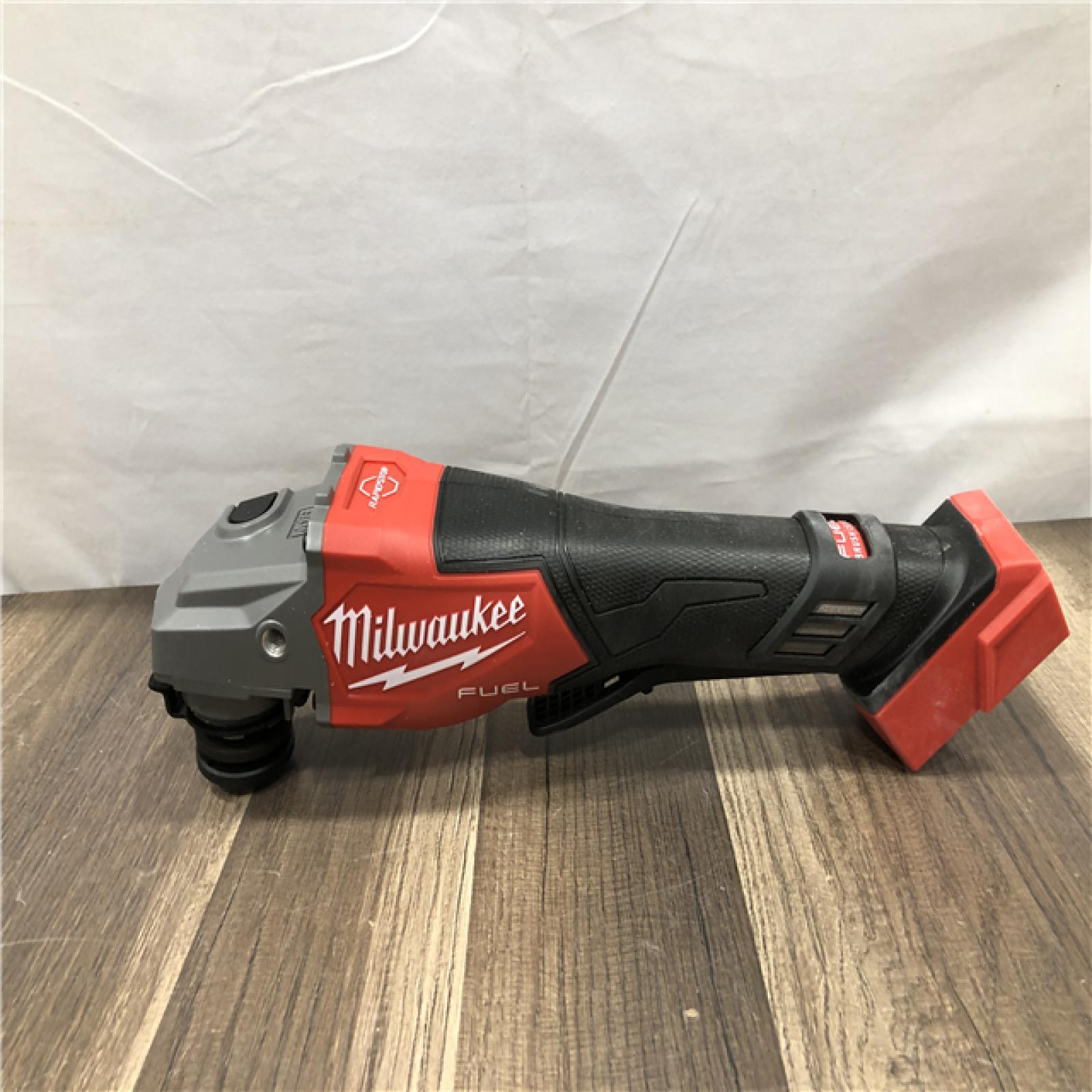 AS-IS Milwaukee  FUEL 18-Volt Lithium-Ion Brushless Cordless 4-1/2 in./6 in. Braking Grinder with Paddle Switch (Tool-Only)