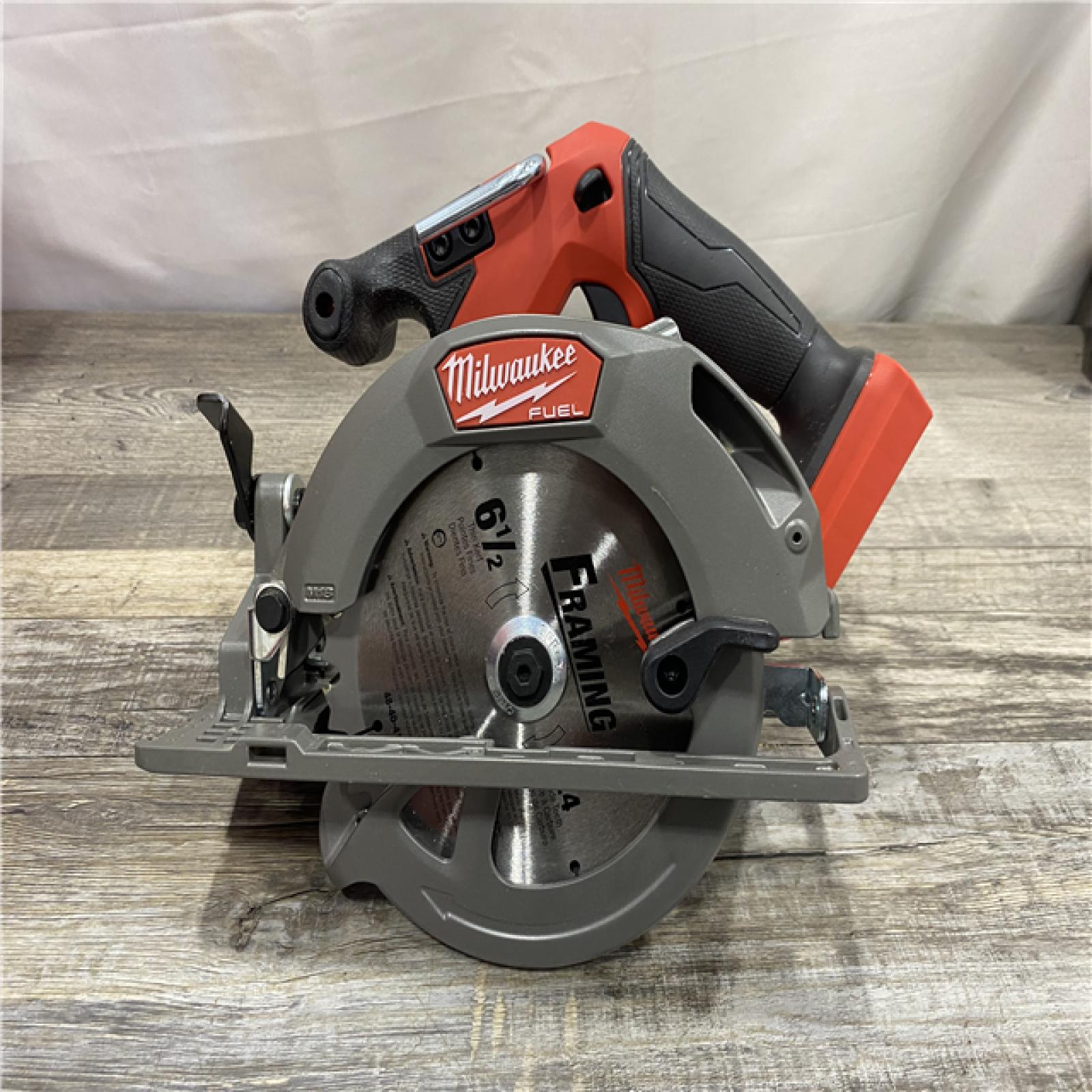 AS-IS Milwaukee FUEL 18V Lithium-Ion Brushless Cordless 6-1/2 in. Circular Saw (Tool-Only)