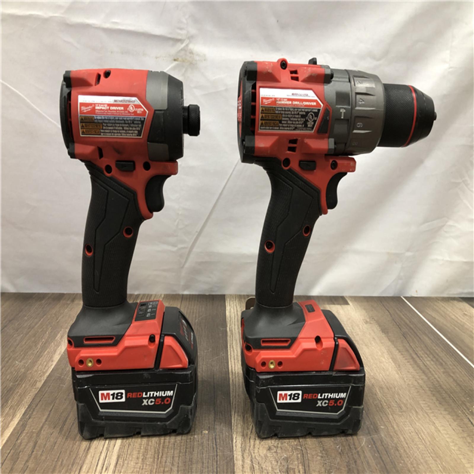 AS-IS Milwaukee FUEL 18V Lithium-Ion Brushless Cordless Hammer Drill and Impact Driver Combo Kit