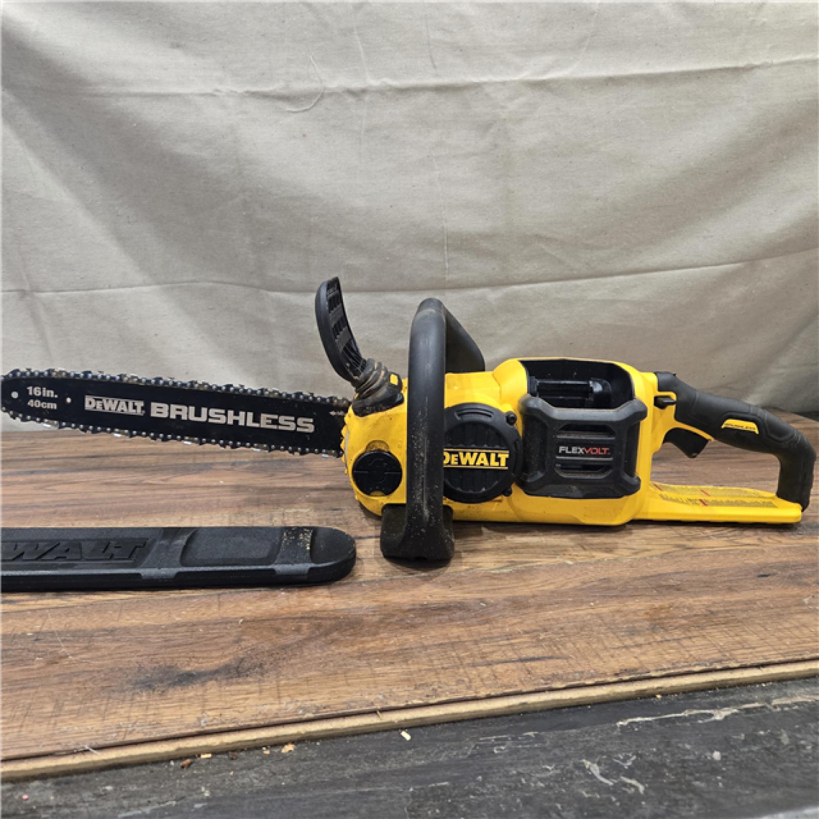 AS-IS DEWALT  FLEXVOLT 60V MAX 16in. Brushless Cordless Battery Powered Chainsaw Kit with (1) FLEXVOLT 2 Ah Battery & Charger