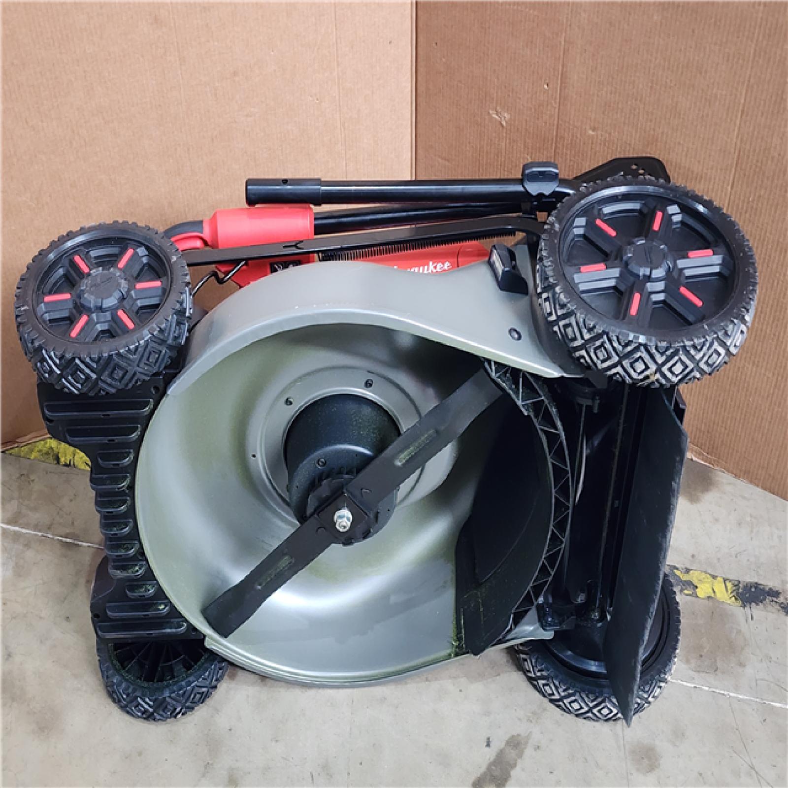 HOUSTON LOCATION - AS-IS Milwaukee M18 FUEL Brushless Cordless 21 in. Walk Behind Dual Battery Self-Propelled Mower Kit W/ BATTERY CHARGER