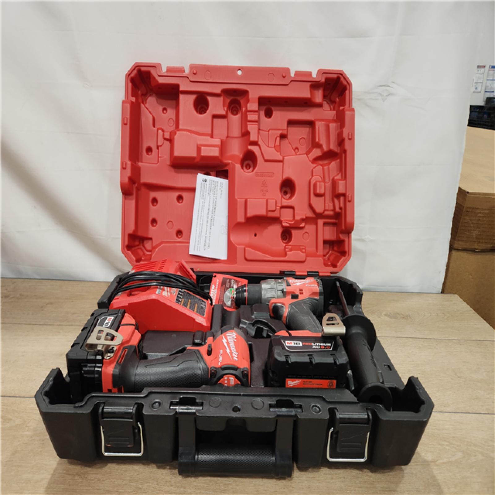 AS-IS- Milwaukee FUEL 18V Lithium-Ion Brushless Cordless Hammer Drill and Impact Driver Combo Kit