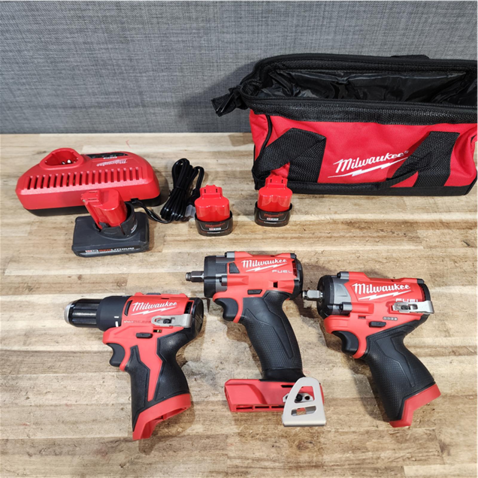 Houston Location AS-IS Milwaukee Drills QTY/3 and Batteries 3 with Charger