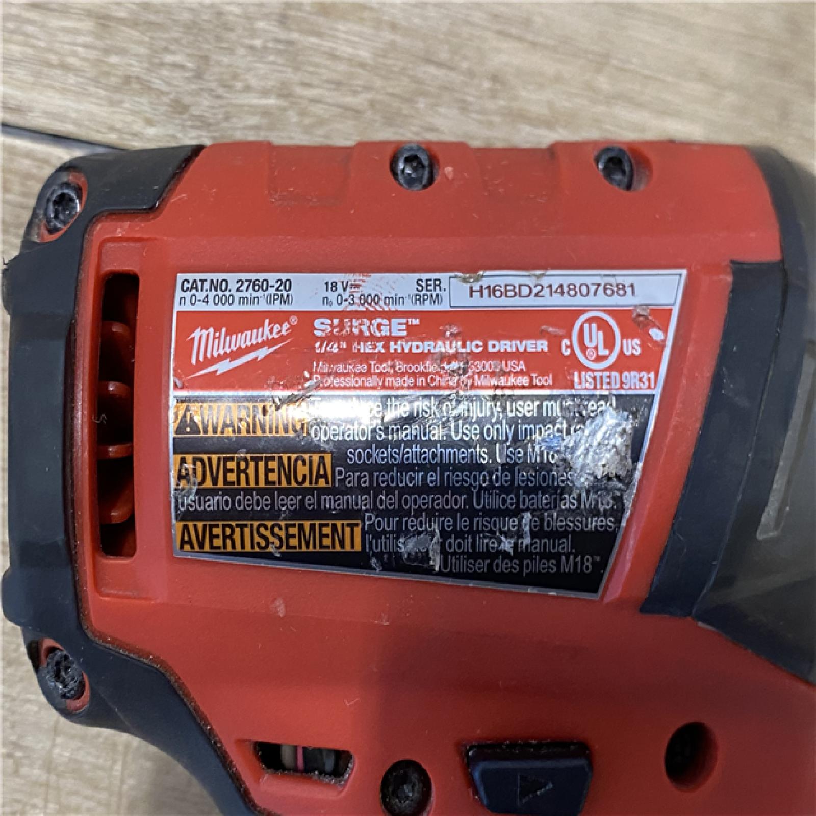 AS-IS Milwaukee FUEL SURGE 18V Lithium-Ion Brushless Cordless 1/4 in. Hex Impact Driver (Tool-Only)