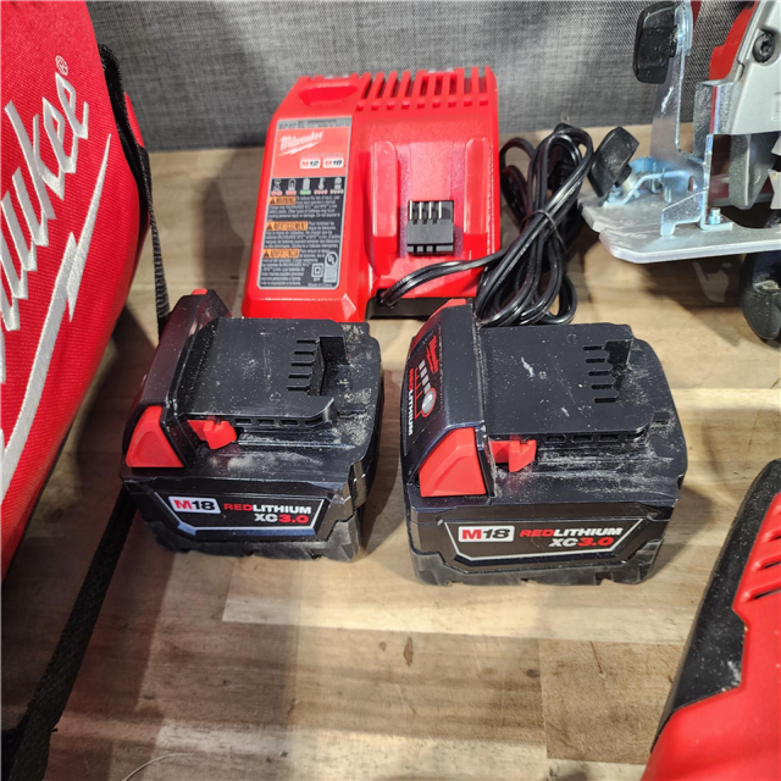 HOUSTON LOCATION - AS-IS Milwaukee M18 18-Volt Lithium-Ion Cordless Combo Kit 7-Tool with 2-Batteries, Charger and Tool Bag