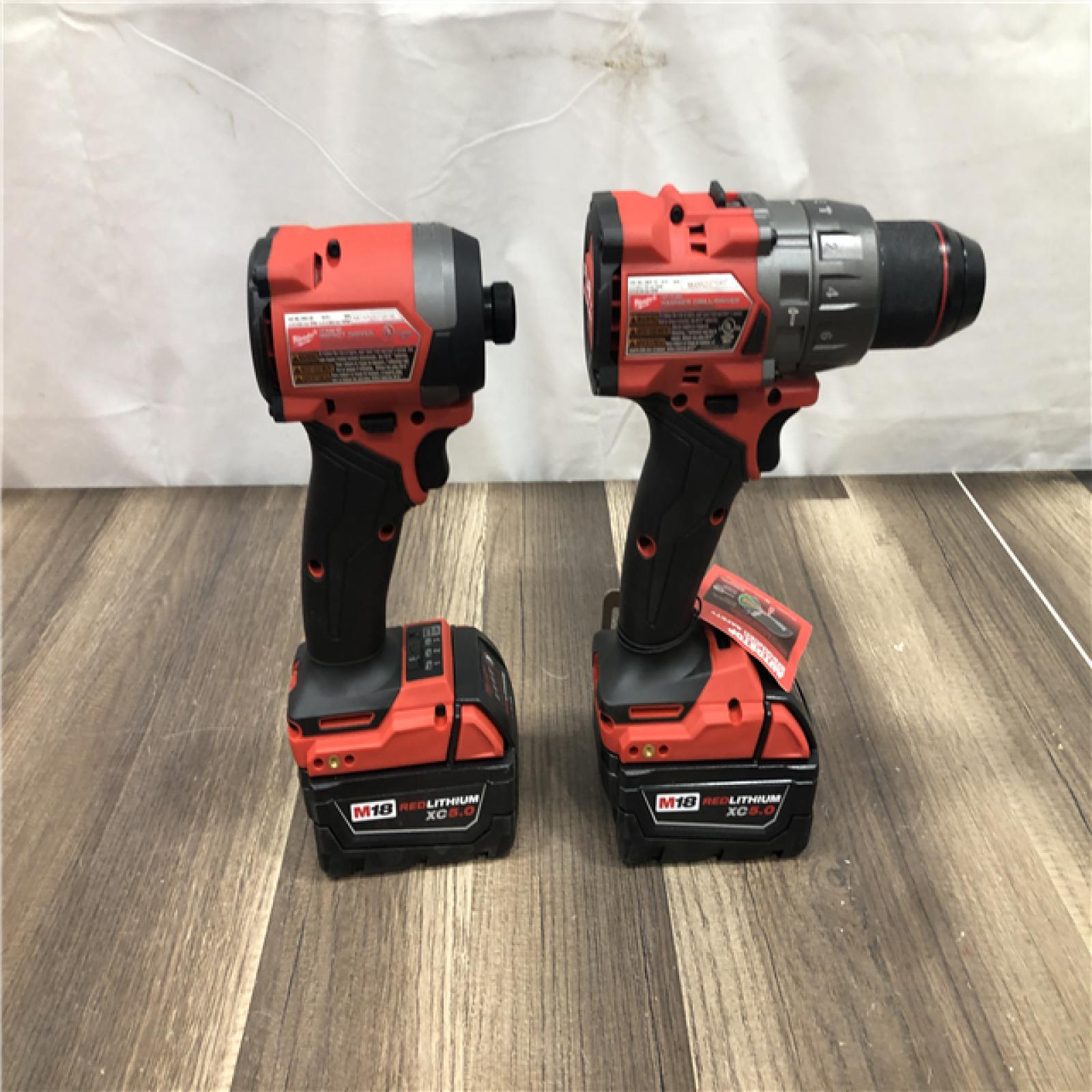 AS-IS Milwaukee FUEL 18V Lithium-Ion Brushless Cordless Hammer Drill and Impact Driver Combo Kit