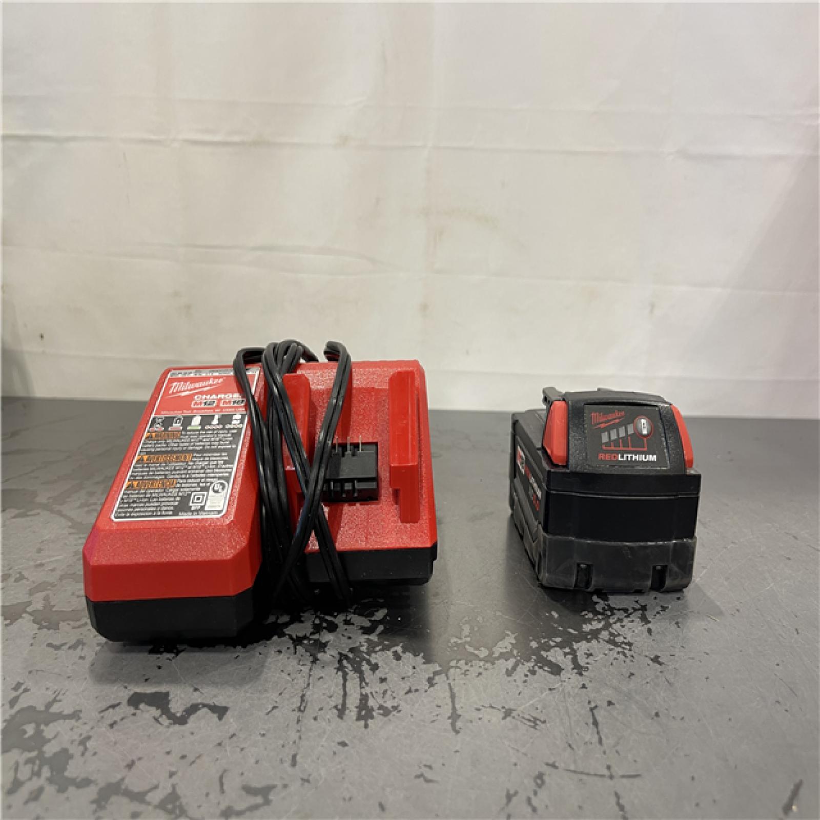 AS-IS- Milwaukee M18 18-Volt Lithium-Ion XC Battery Starter Kit