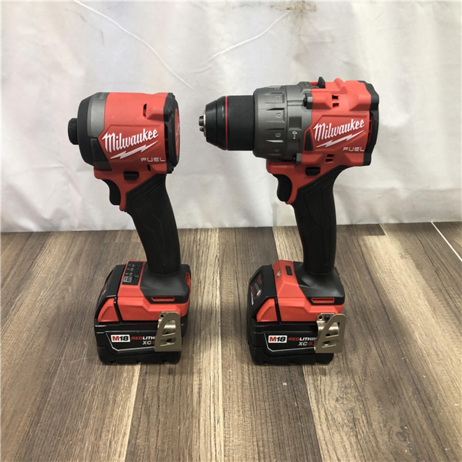 AS-IS Milwaukee FUEL 18V Lithium-Ion Brushless Cordless Hammer Drill and Impact Driver Combo Kit