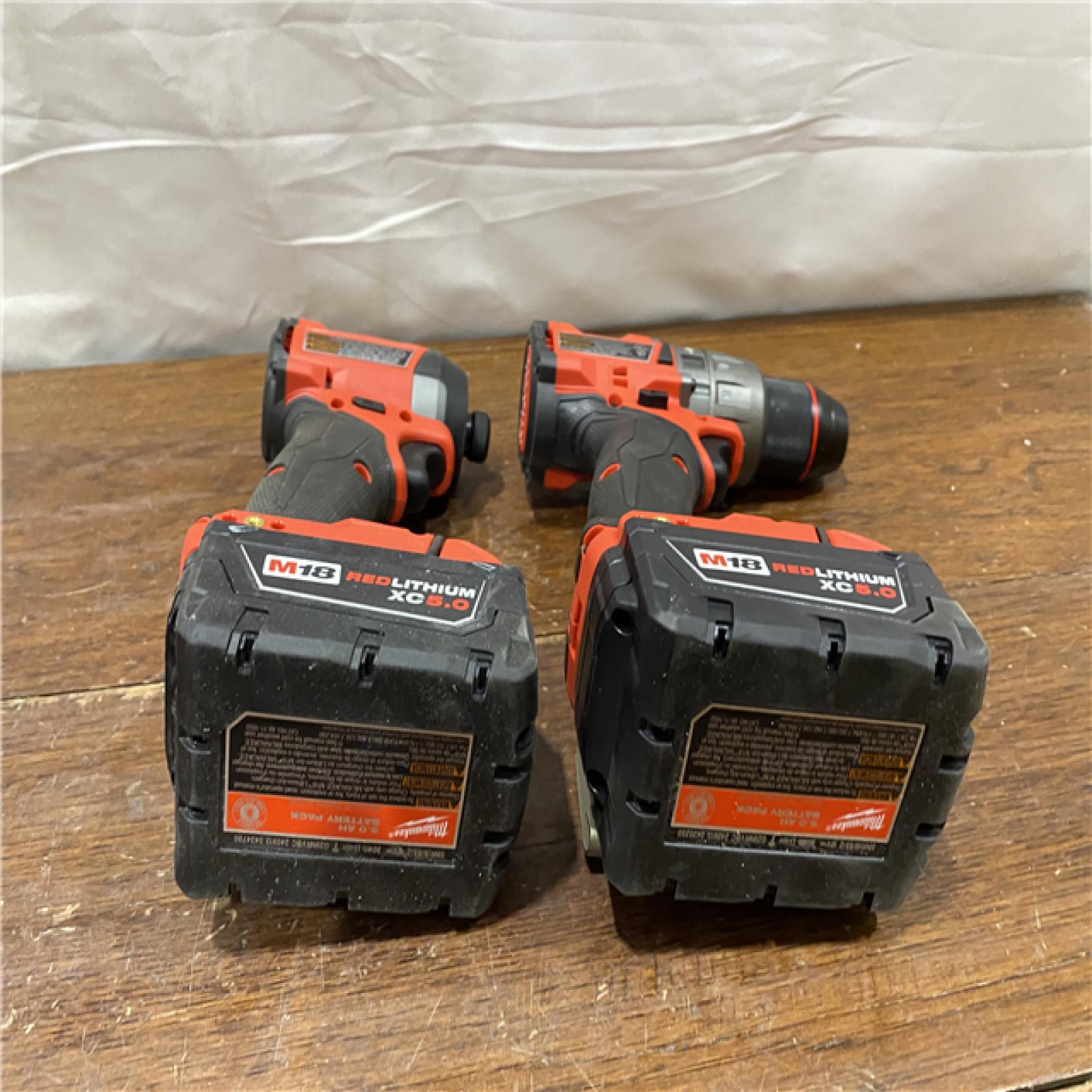 AS-IS MILWAUKEE M18 FUEL 18V Lithium-Ion Brushless Cordless Hammer Drill and Impact Driver Combo Kit (2-Tool) with 2 Batteries