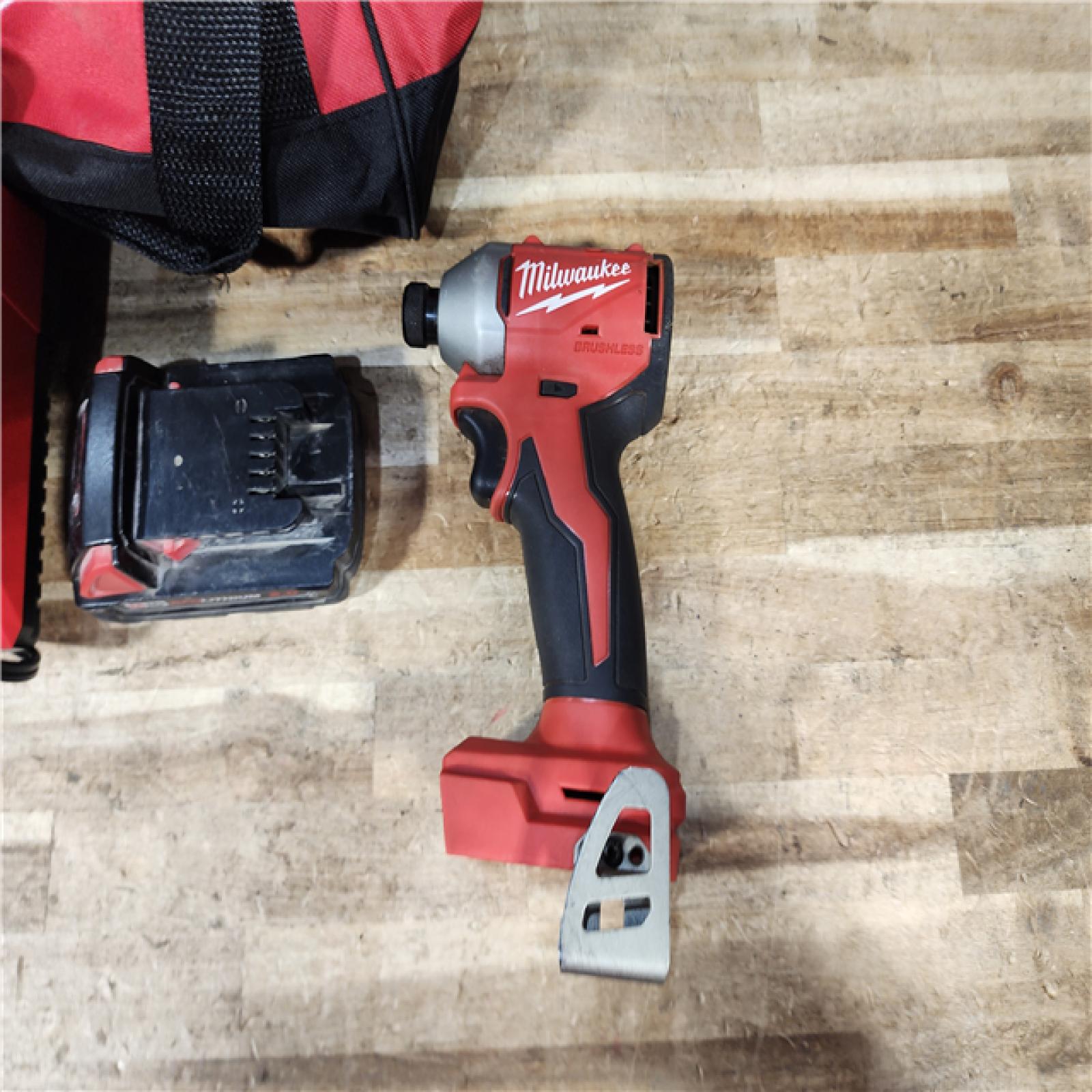 HOUSTON LOCATION - AS - IS Milwaukee 18-Volt Lithium-Ion Compact Brushless Cordless 1/4 in. Impact Driver Kit