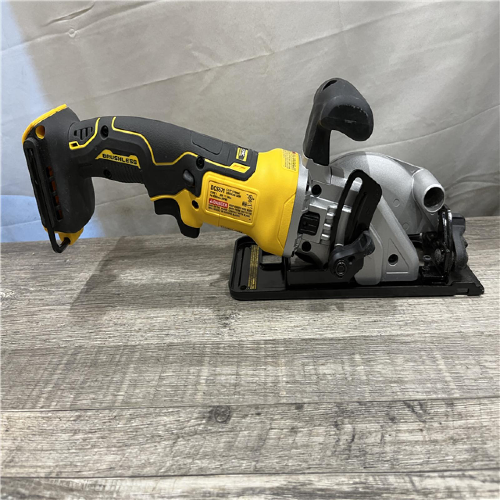 AS-IS DEWALT ATOMIC 20V MAX Cordless Brushless 4-1/2 in. Circular Saw (Tool Only)