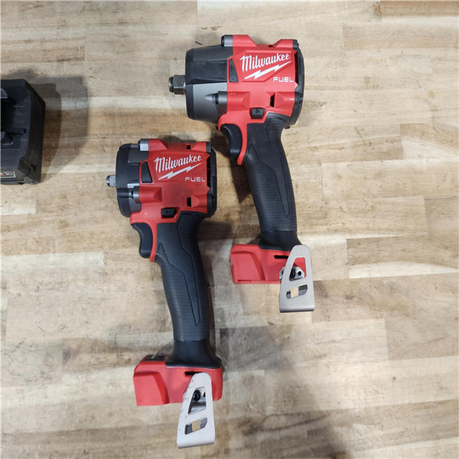 HOUSTON LOCATION - AS-IS MILWAUKEE 2 TOOL COMBO KIT W/ (2) BATTERY & CHARGER