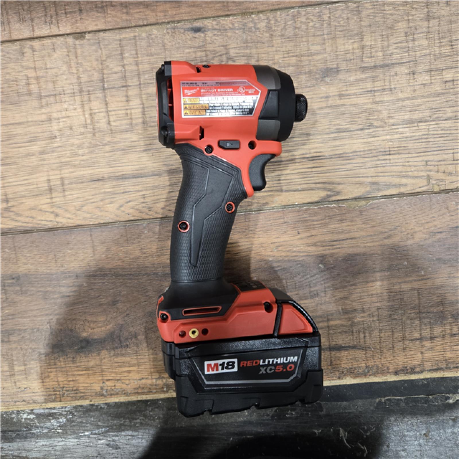 AS-IS MILWAUKEE FUEL 18V Lithium-Ion Brushless Cordless Hammer Drill and Impact Driver Combo Kit (2-Tool) with 2 Batteries