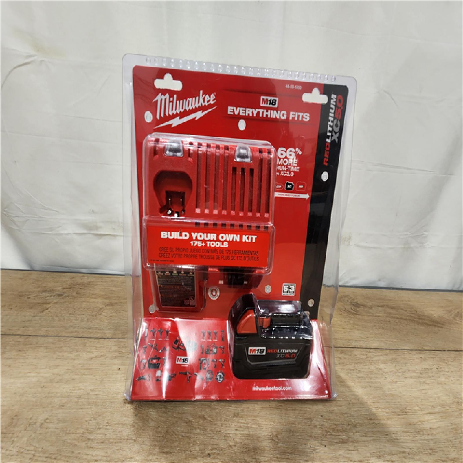 NEW- Milwaukee 18-Volt Lithium-Ion XC Starter Kit with One 5.0Ah Battery and Charger