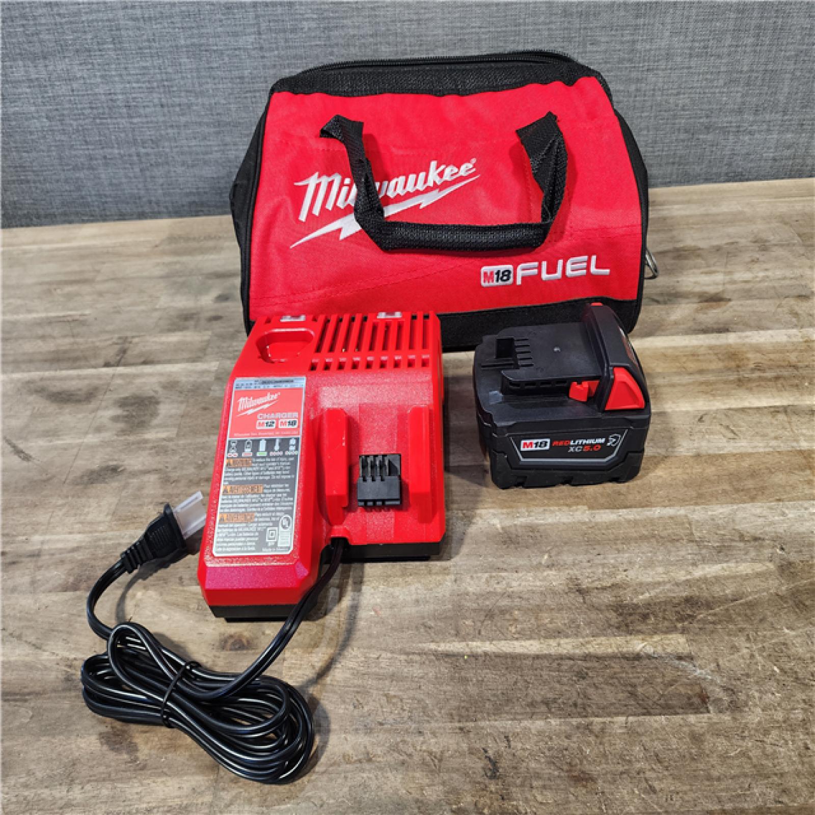 HOUSTON LOCATION - AS-IS Milwaukee M18 1/2 in. Cordless Brushless High Torque Impact Wrench Kit (Battery & Charger)