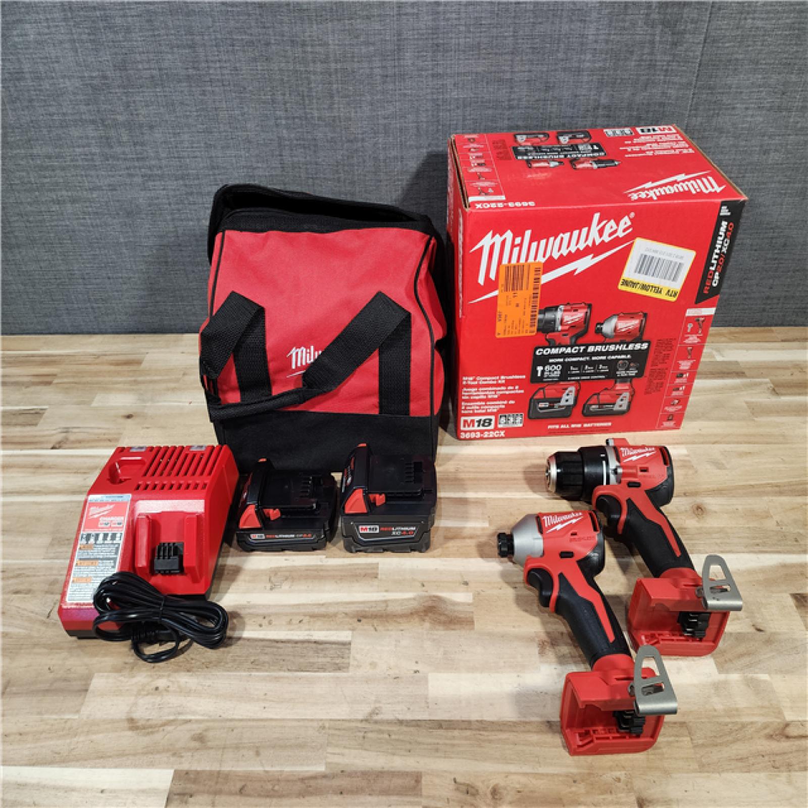 HOUSTON LOCATION - AS-IS Milwaukee 18-Volt Lithium-Ion Brushless Cordless Compact Hammer Drill/Impact Combo Kit
