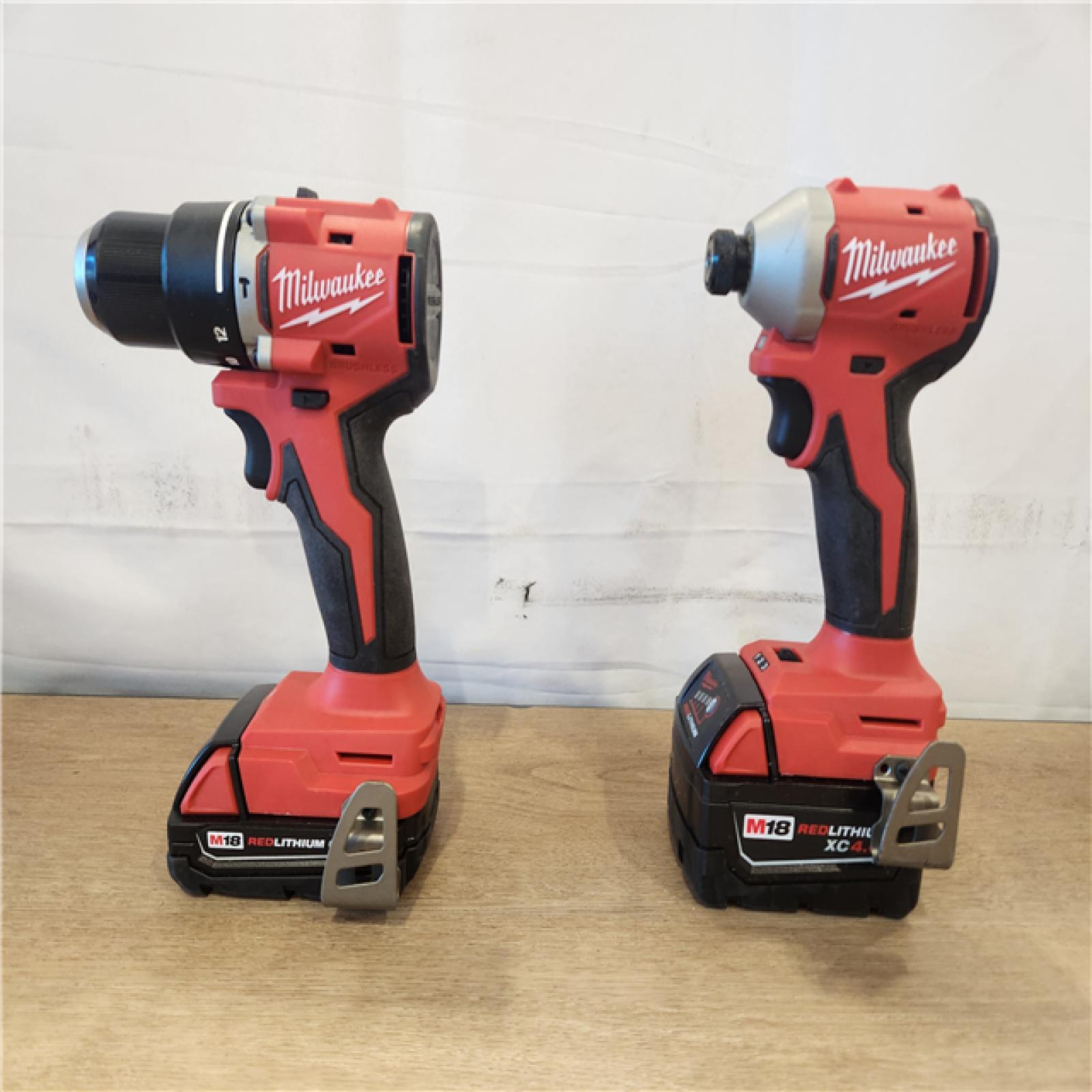 AS-IS- M18 18-Volt Lithium-Ion Brushless Cordless Compact Hammer Drill/Impact Combo Kit (2-Tool) with (2) Batteries  Bag