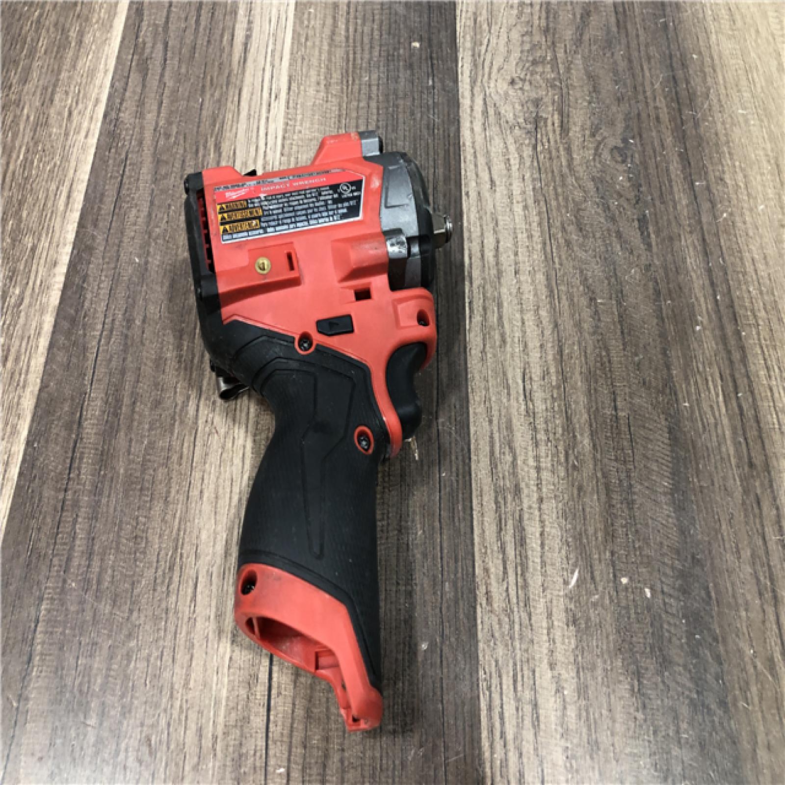 AS-IS Milwaukee FUEL 12V Lithium-Ion Brushless Cordless Stubby 3/8 in. Impact Wrench (Tool-Only)