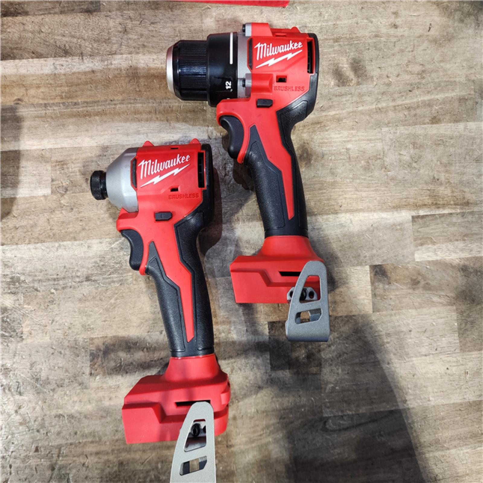 HOUSTON LOCATION - AS-IS Milwaukee M18 18V Lithium-Ion Brushless Cordless Compact Drill/Impact Combo Kit (2-Tool) W/(2) 2.0 Ah Batteries  Charger & Bag