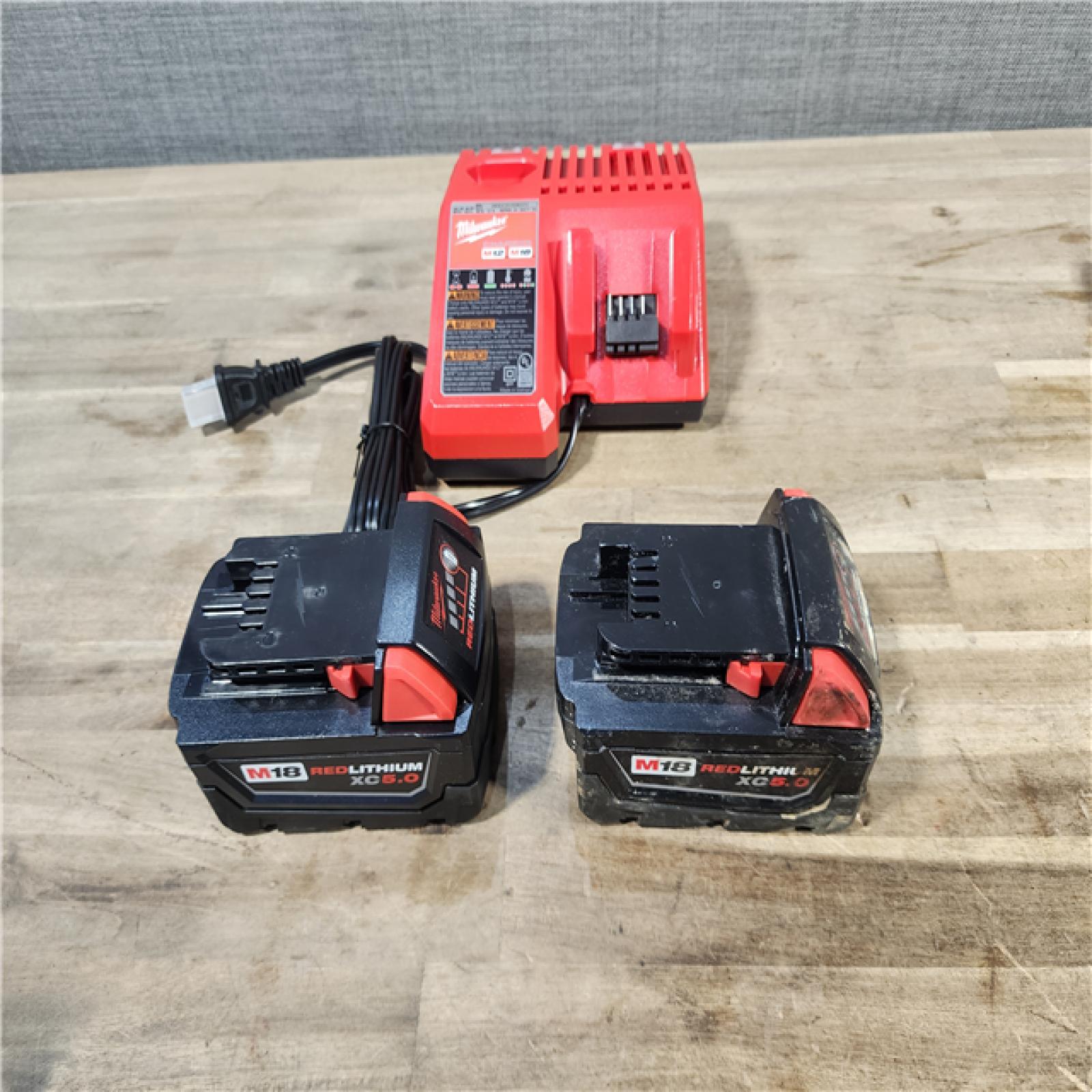 HOUSTON LOCATION - AS-IS MILWAUKEE 2 TOOL COMBO KIT W/ (2) BATTERY & CHARGER