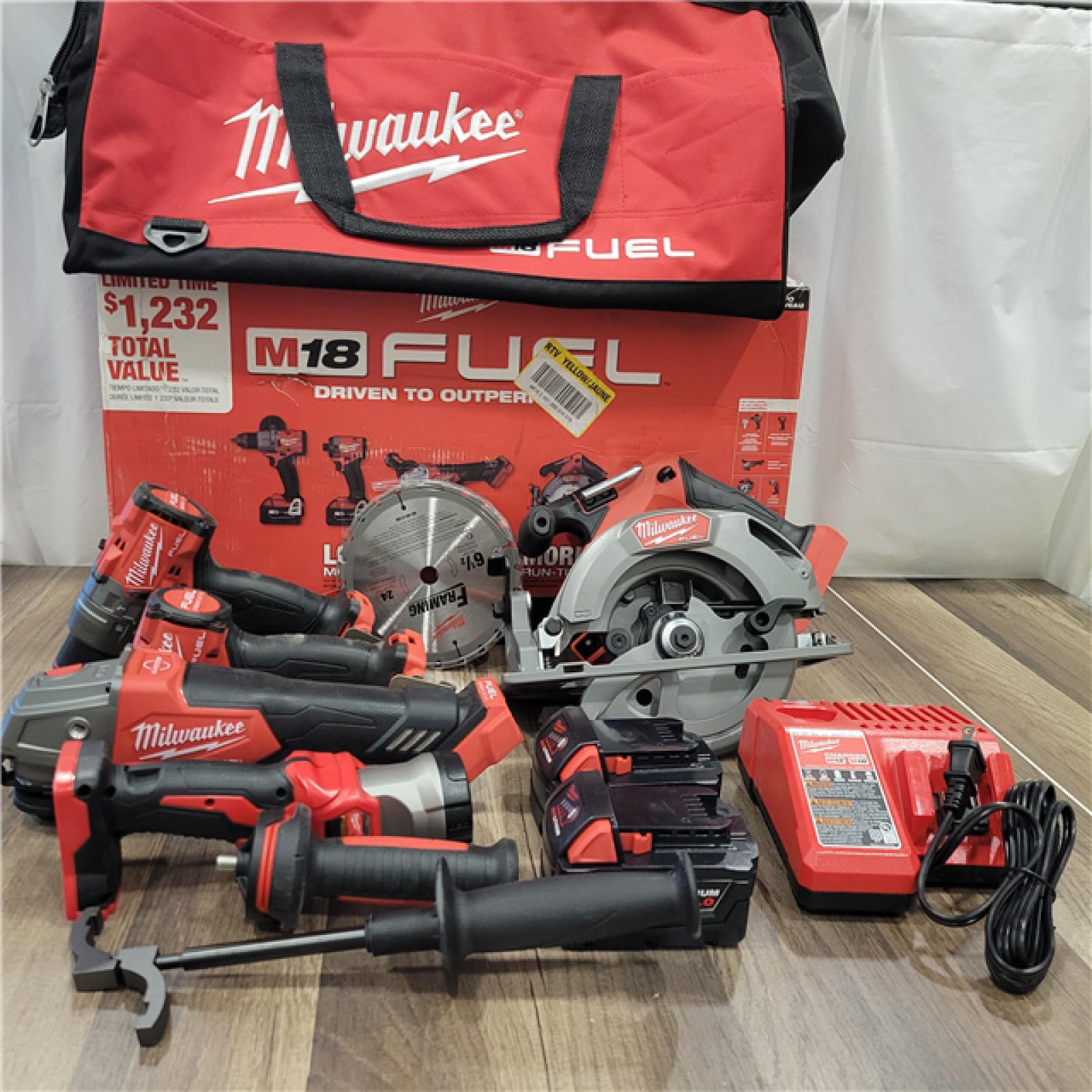 AS-IS MILWAUKEE M18 18-Volt Lithium-Ion Brushless Cordless FUEL Combo Kit (5-Tool) with 2-Batteries, 1-Charger, and Tool Bag