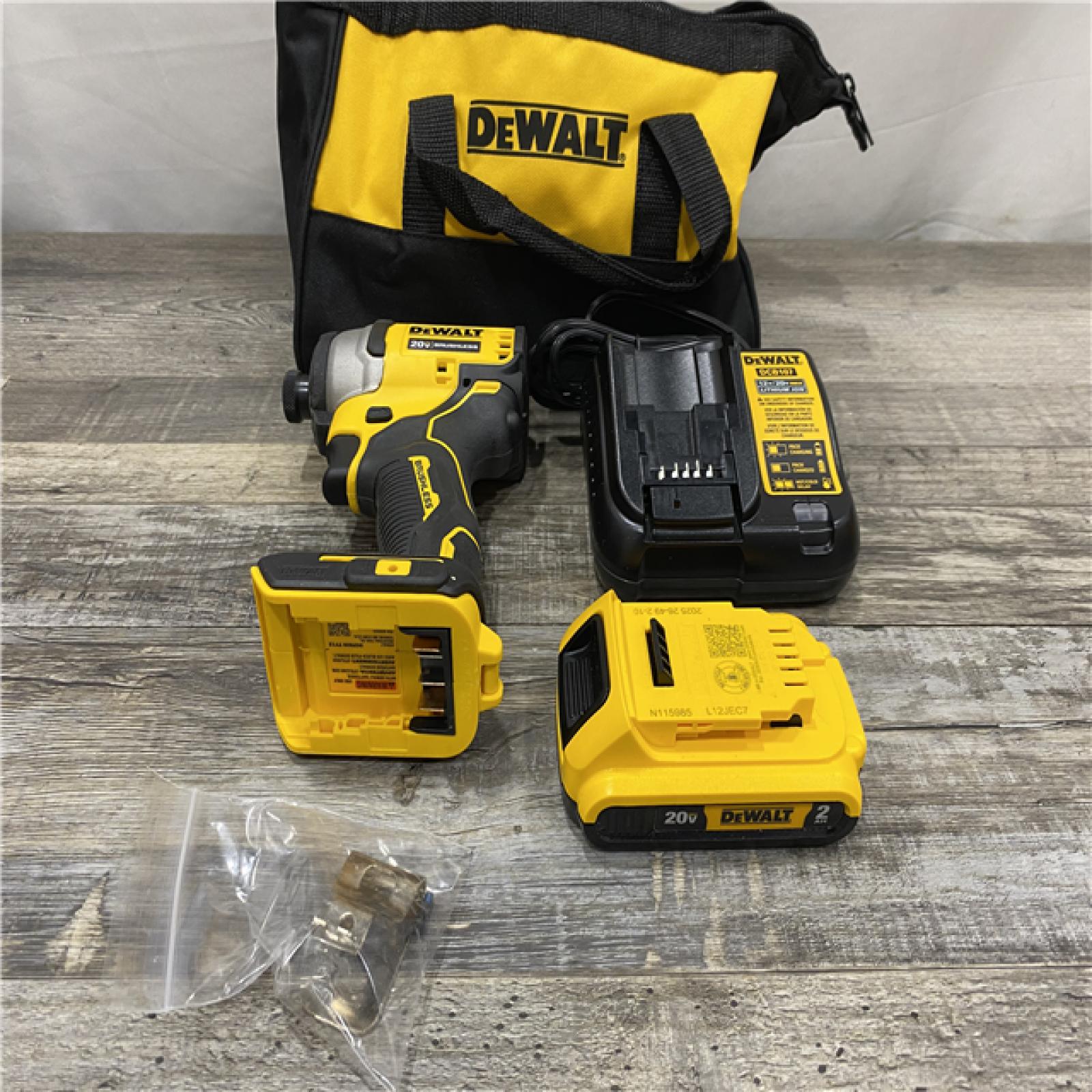 AS-IS DEWALT Atomic 20V Max Lithium-Ion Brushless Cordless Compact 1/4 in. Impact Driver Kit