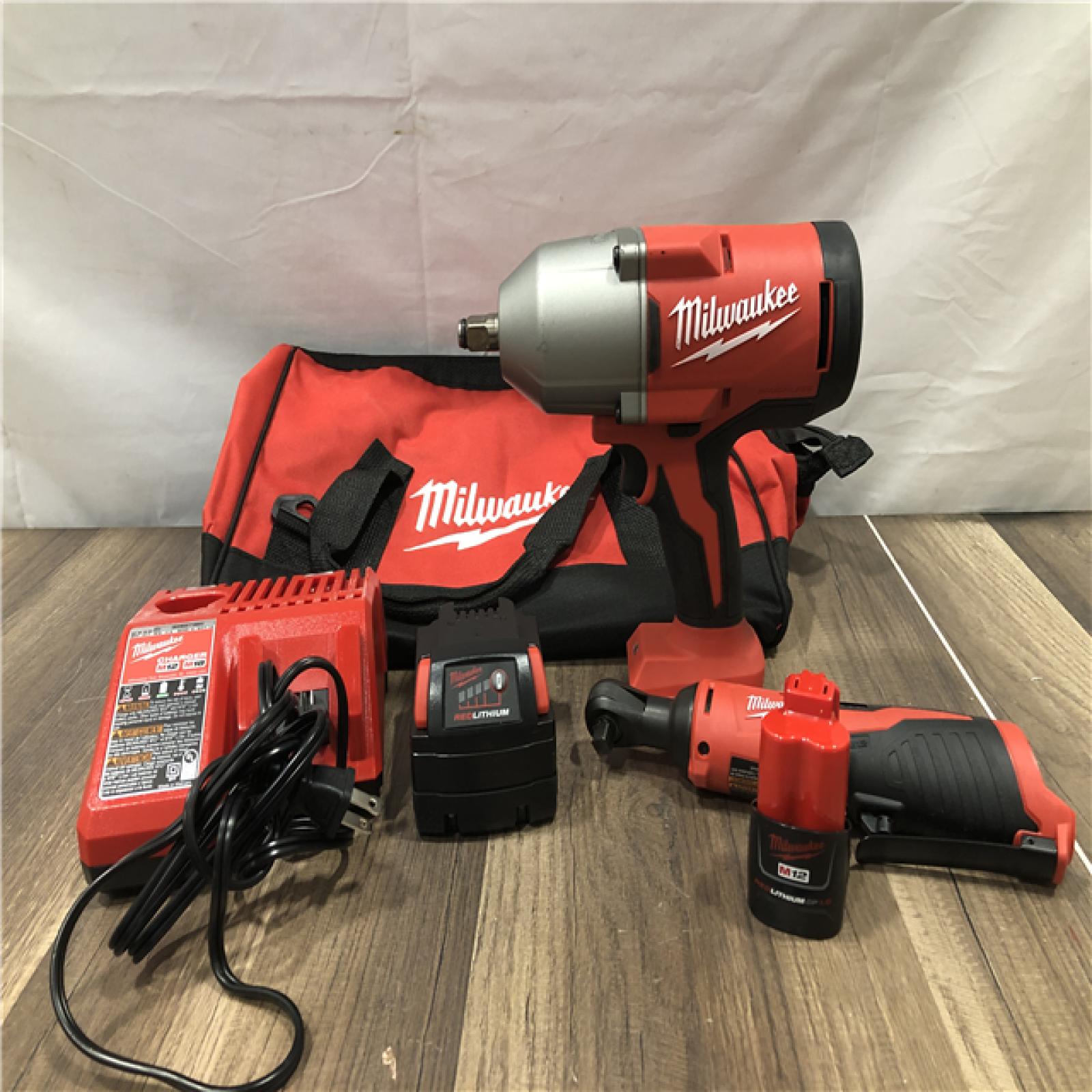 AS-IS Milwaukee 12/18V Lithium-Ion Cordless 3/8 in. Ratchet and 1/2 in. High Torque Impact Wrench with Friction Ring Combo Kit