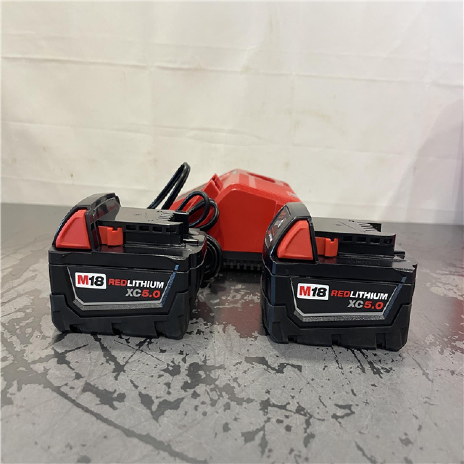 AS-IS- Milwaukee M18 18-Volt Lithium-Ion XC Starter Kit with Two 5.0Ah Batteries and Charger