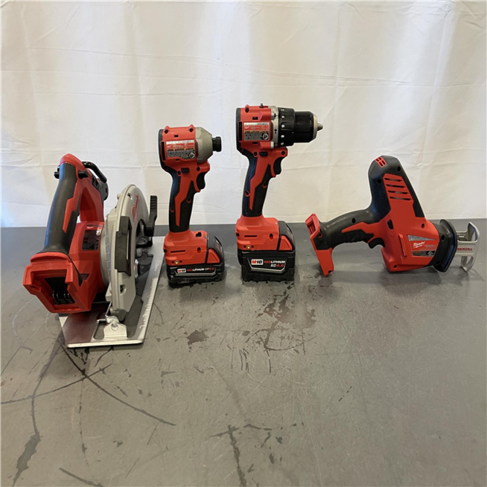 AS-IS - Milwaukee M18 18-Volt Lithium-Ion Brushless Cordless Combo Kit (4-Tool)