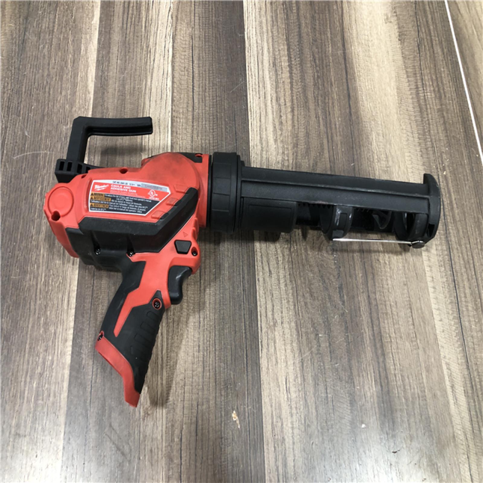 AS-IS Milwaukee 12V Lithium-Ion Cordless 10 oz. Adhesive and Caulk Gun (Tool-Only)