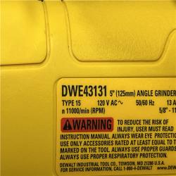 AS-IS DEWALT 13 Amp Corded 4.5 - 5 in. Angle Grinder Kit with Dust Shroud