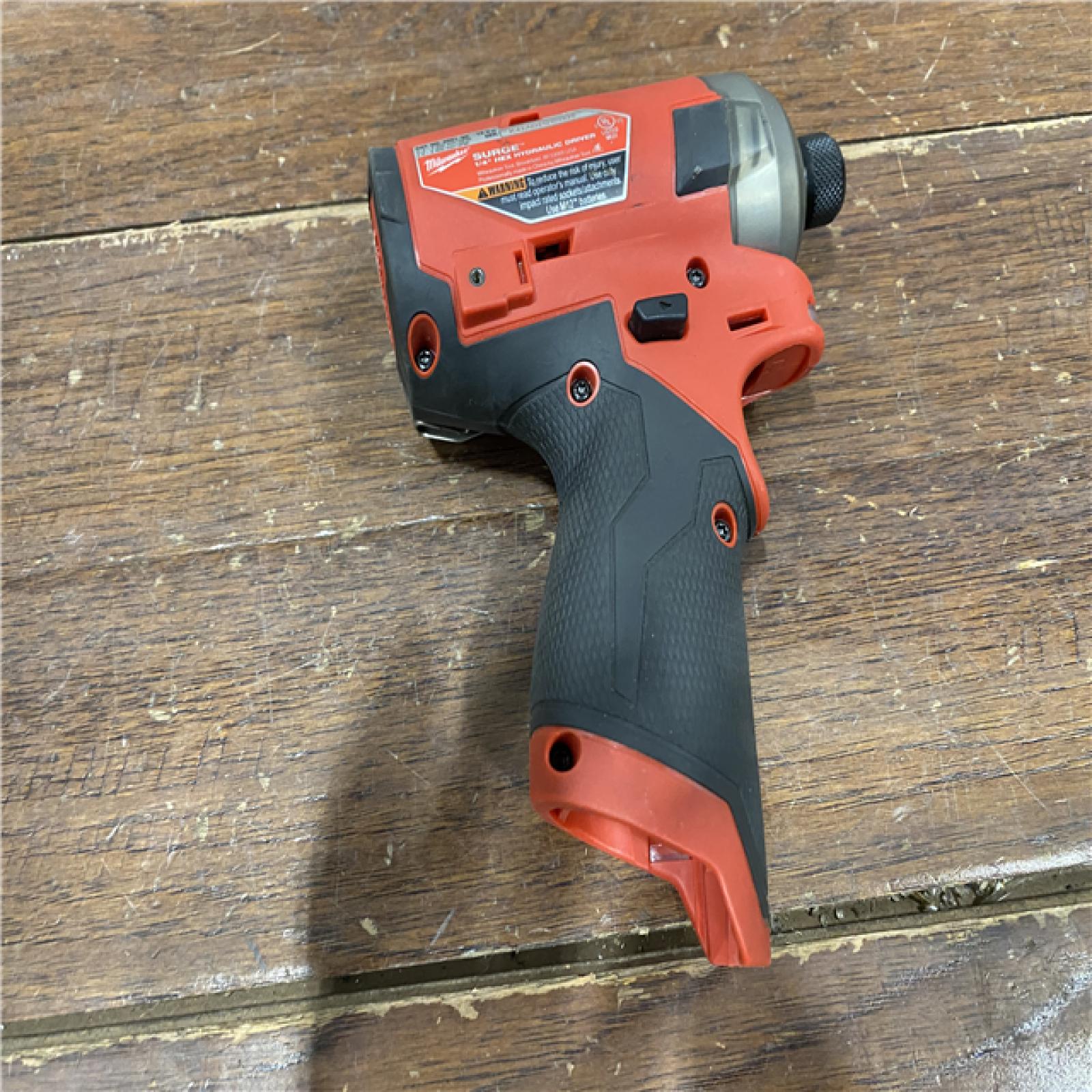 AS-IS M12 FUEL SURGE 12V Lithium-Ion Brushless Cordless 1/4 in. Hex Impact Driver Compact Kit W/Two 2.0Ah Batteries, Bag