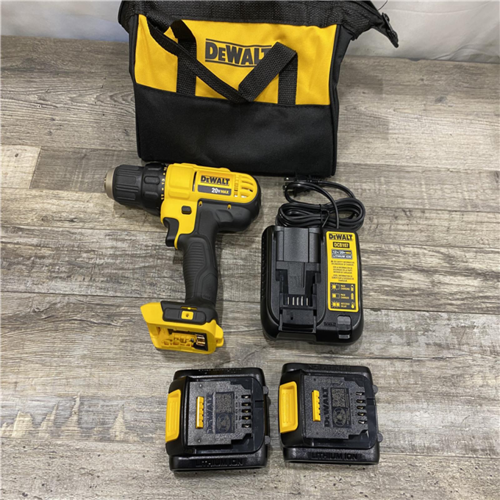 AS-IS DEWALT 20V MAX Cordless 1/2 in. Drill/Driver  (2) 20V 1.3Ah Batteries  Charger and Bag