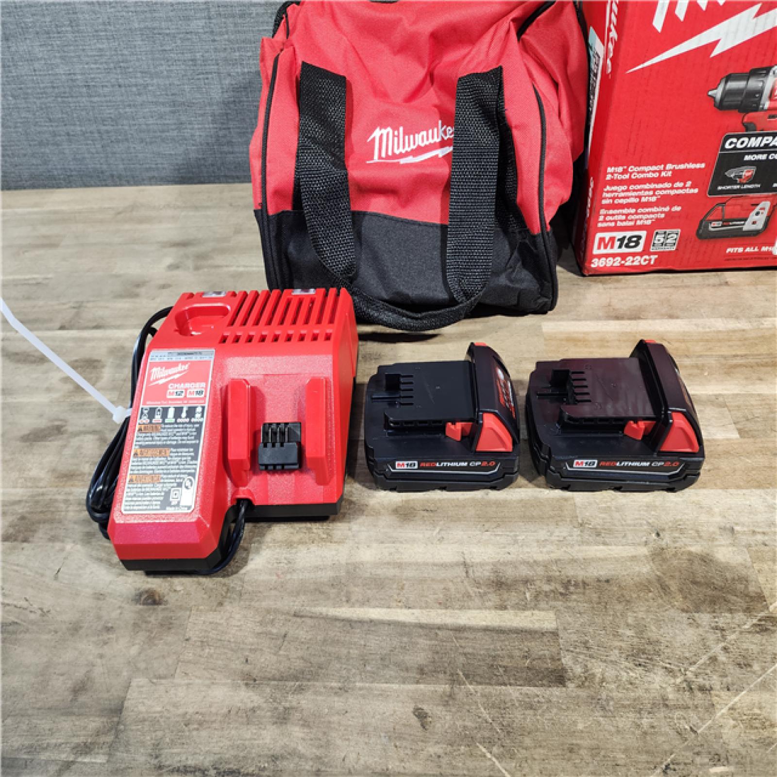 HOUSTON LOCATION - AS-IS Milwaukee M18 18V Lithium-Ion Brushless Cordless Compact Drill/Impact Combo Kit (2-Tool) W/(2) 2.0 Ah Batteries, Charger & Bag