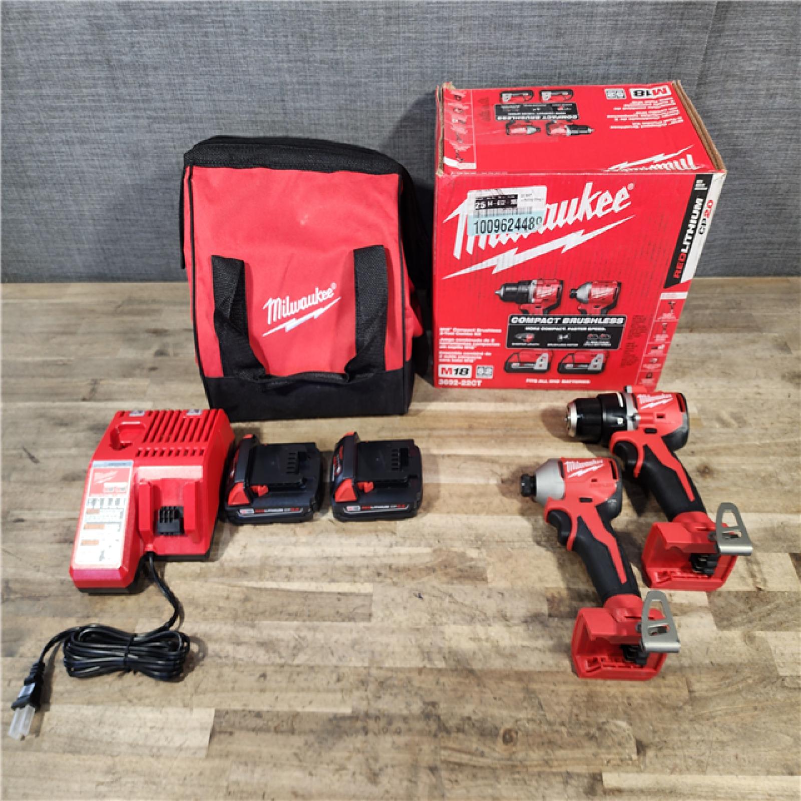 HOUSTON LOCATION - AS-IS Milwaukee M18 18V Lithium-Ion Brushless Cordless Compact Drill/Impact Combo Kit (2-Tool) W/(2) 2.0 Ah Batteries  Charger & Bag