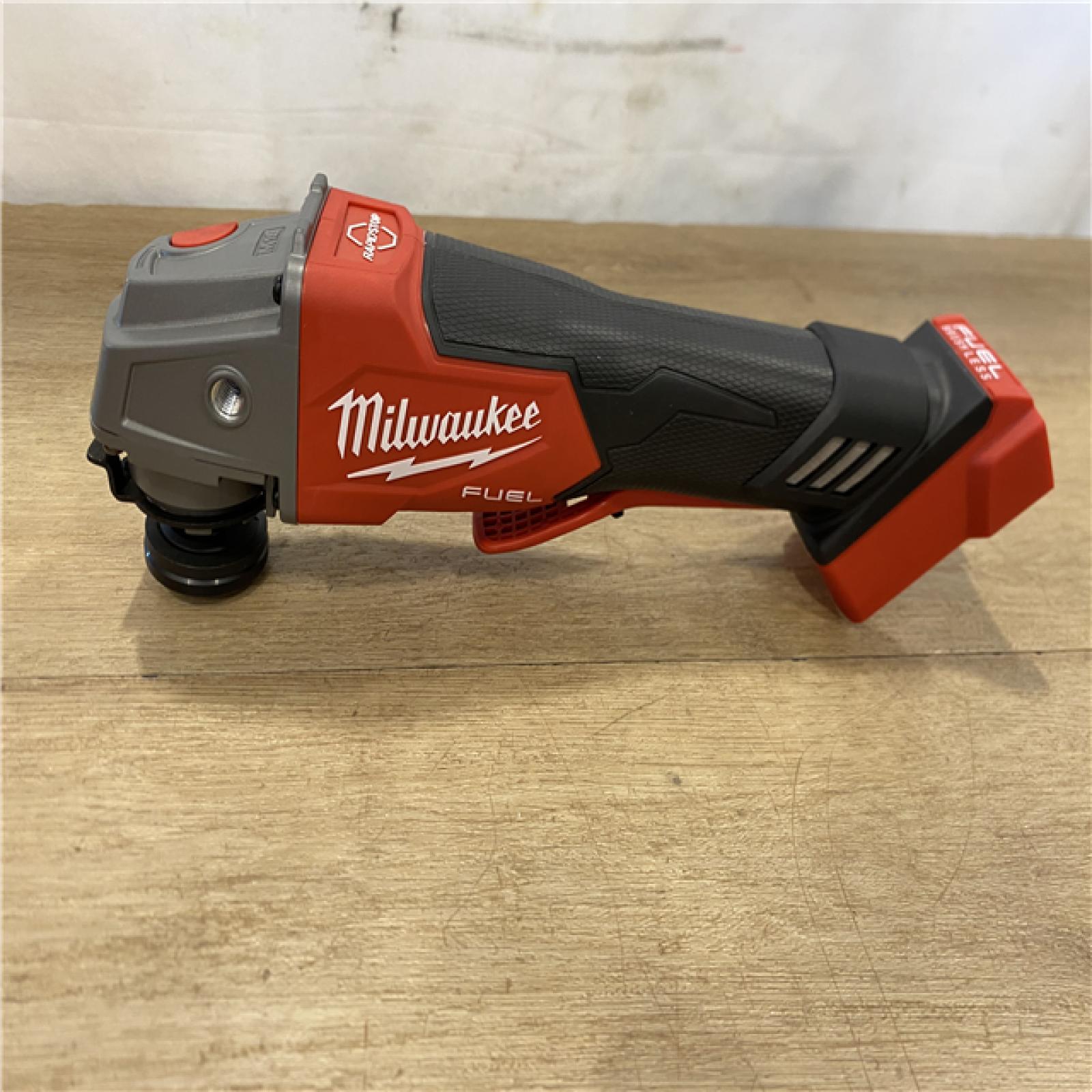 AS-IS Milwaukee FUEL 18V Lithium-Ion Brushless Cordless 4-1/2 in./5 in. Grinder w/Paddle Switch (Tool-Only)