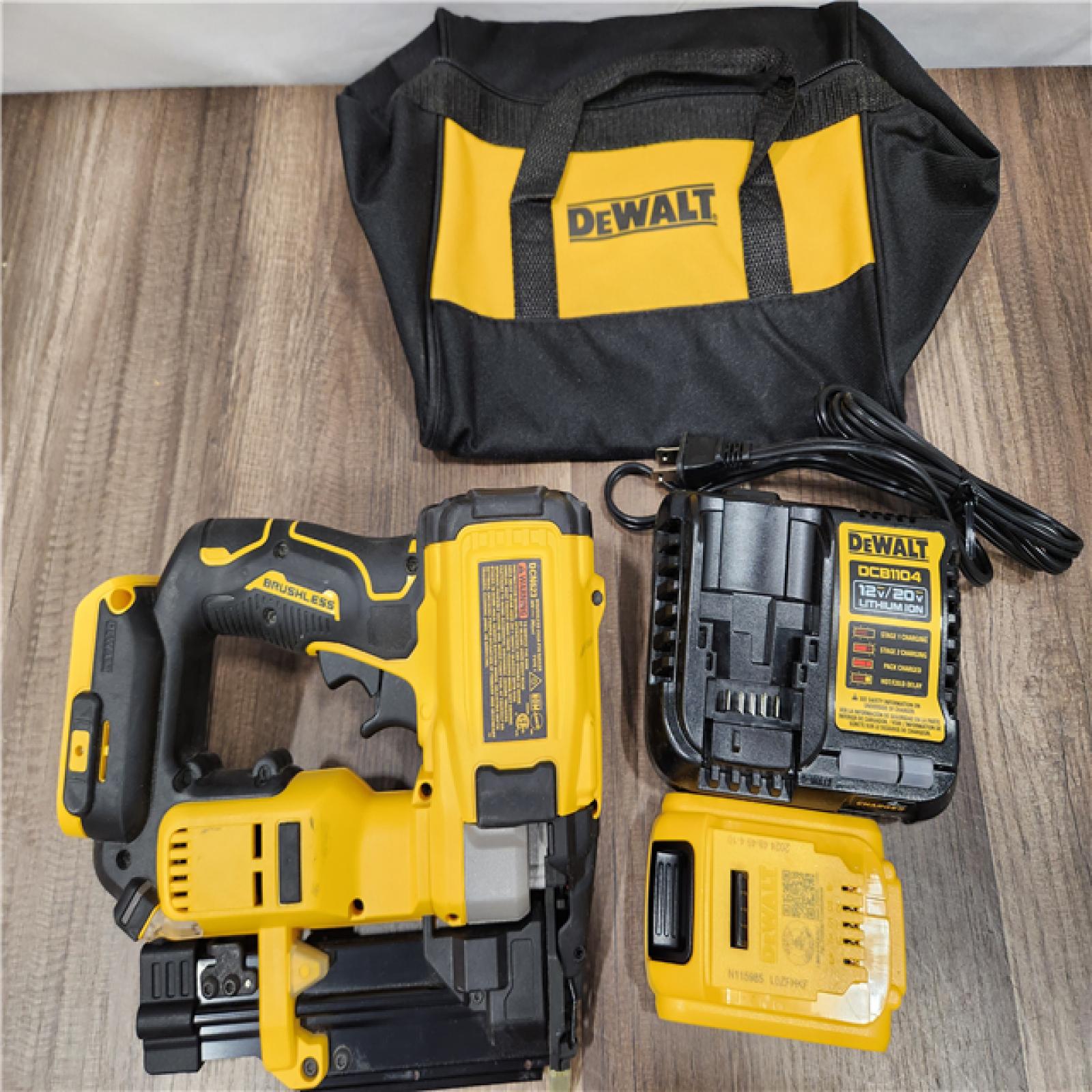 AS-IS DEWALT ATOMIC 20V MAX Lithium Ion Cordless 23 Gauge Pin Nailer Kit with 2.0Ah Battery and Charger