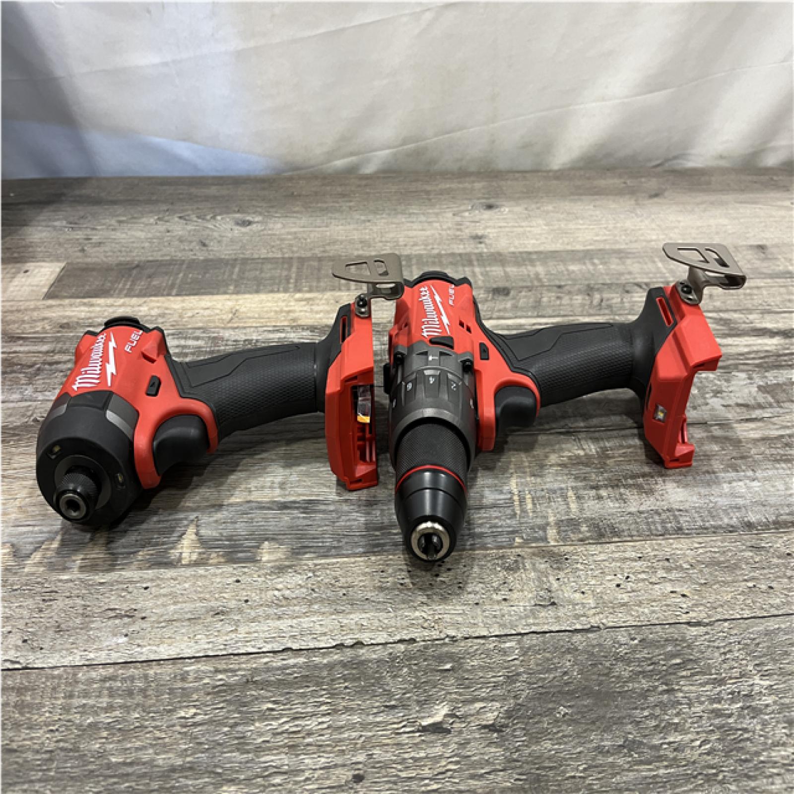 AS-IS Milwaukee FUEL 18V Lithium-Ion Brushless Cordless Hammer Drill and Impact Driver Combo Kit