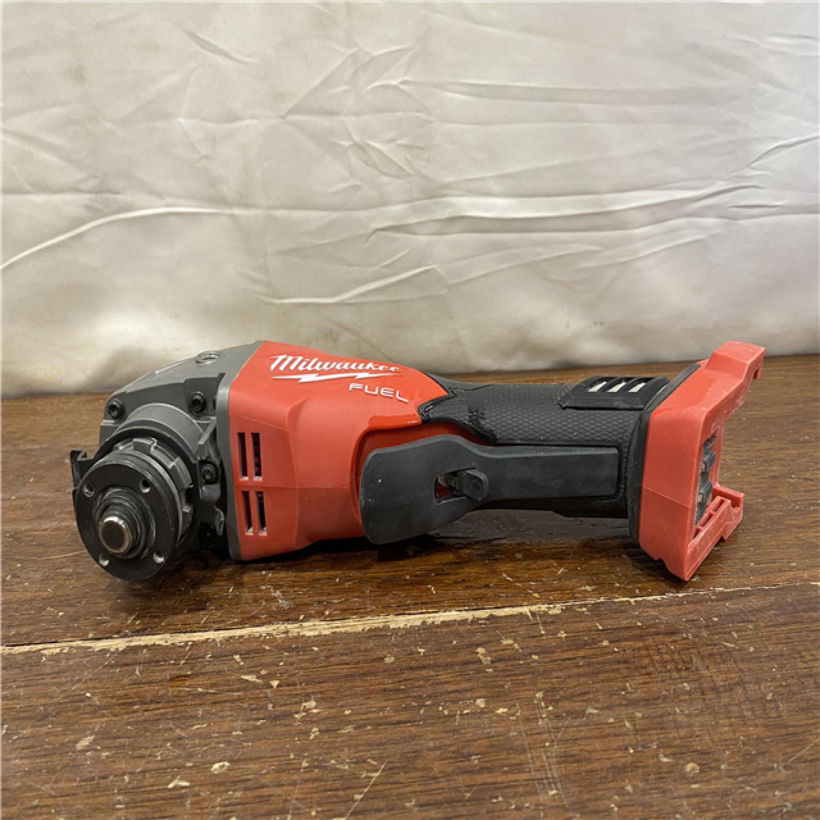 AS-IS Milwaukee 2880-20 M18 FUEL 18-Volt Lithium-Ion Brushless Cordless 4-1/2 in./5 in. Grinder W/Paddle Switch (Tool-Only)