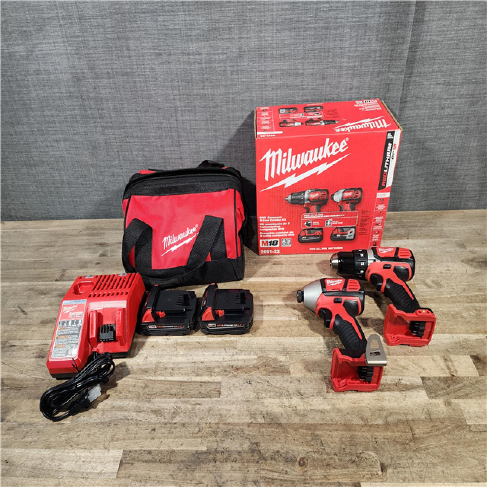 HOUSTON LOCATION - AS-IS Milwaukee M18 Brushed Cordless (2-Tool) Drill/Driver and Impact Driver Kit