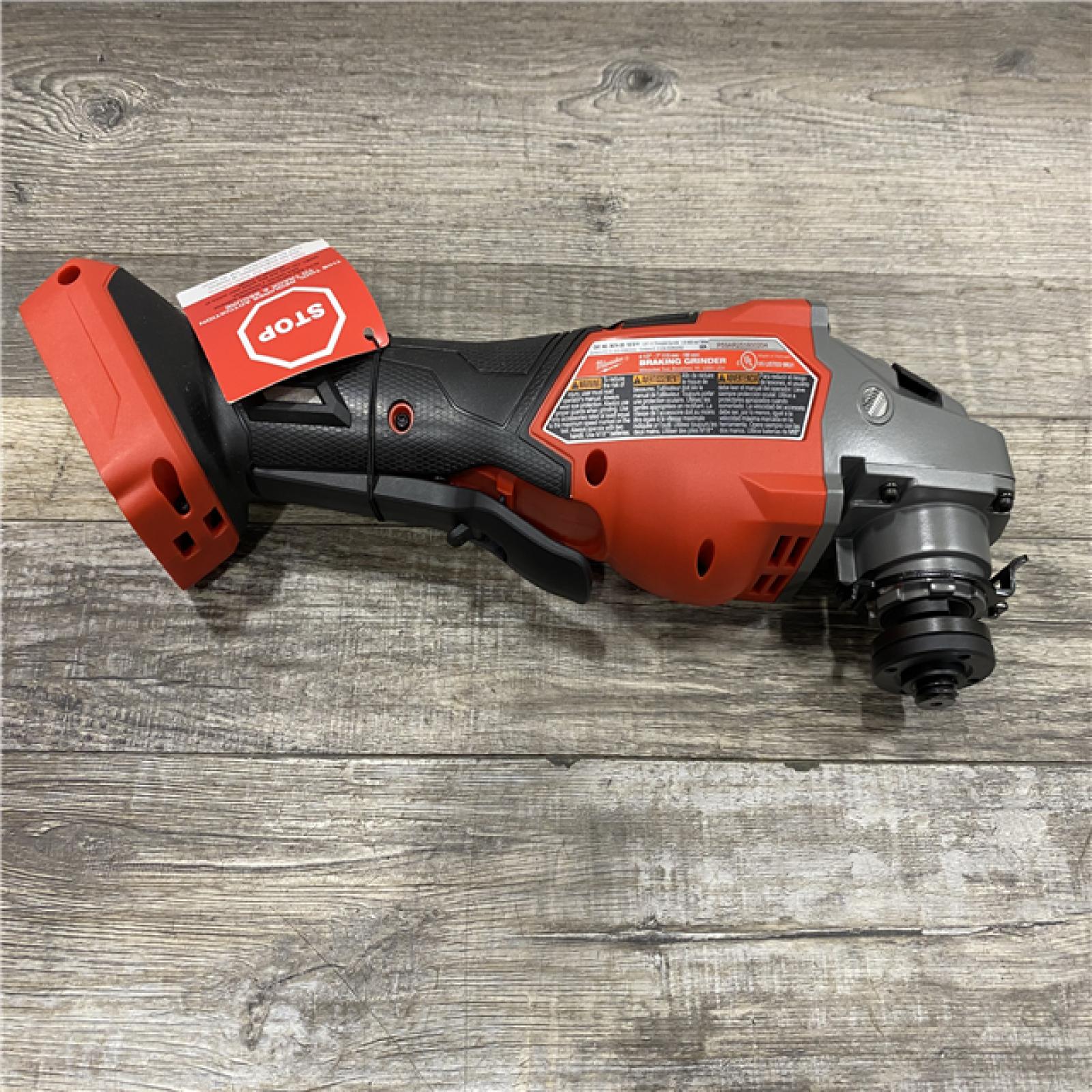 AS-IS Milwaukee FUEL 18-Volt Lithium-Ion Brushless Cordless 7 in. Braking Grinder with Variable Speed and Paddle Switch (Tool-Only)