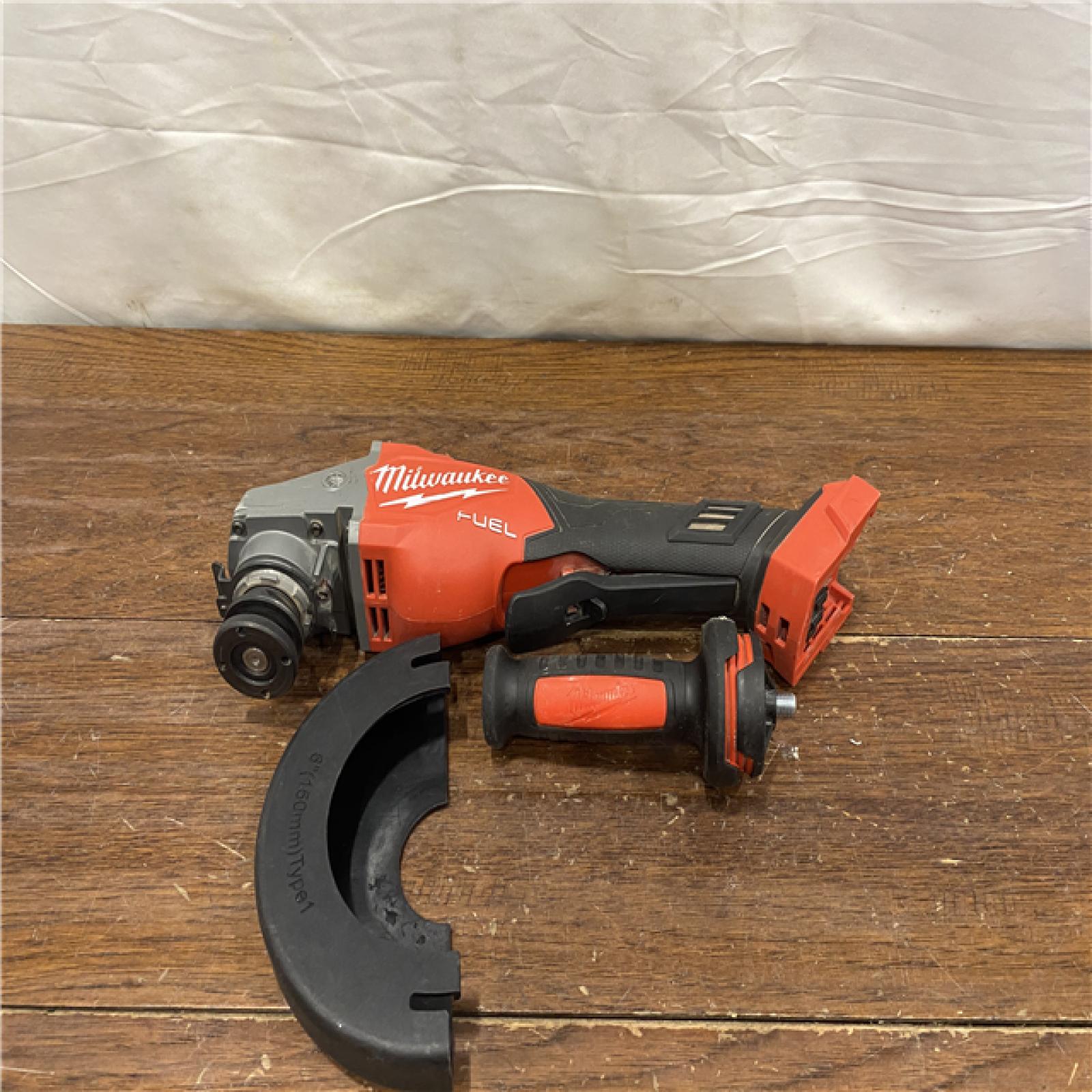 AS-IS Milwaukee M18 FUEL 4-1/2-6 Braking Grinder, Paddle Switch