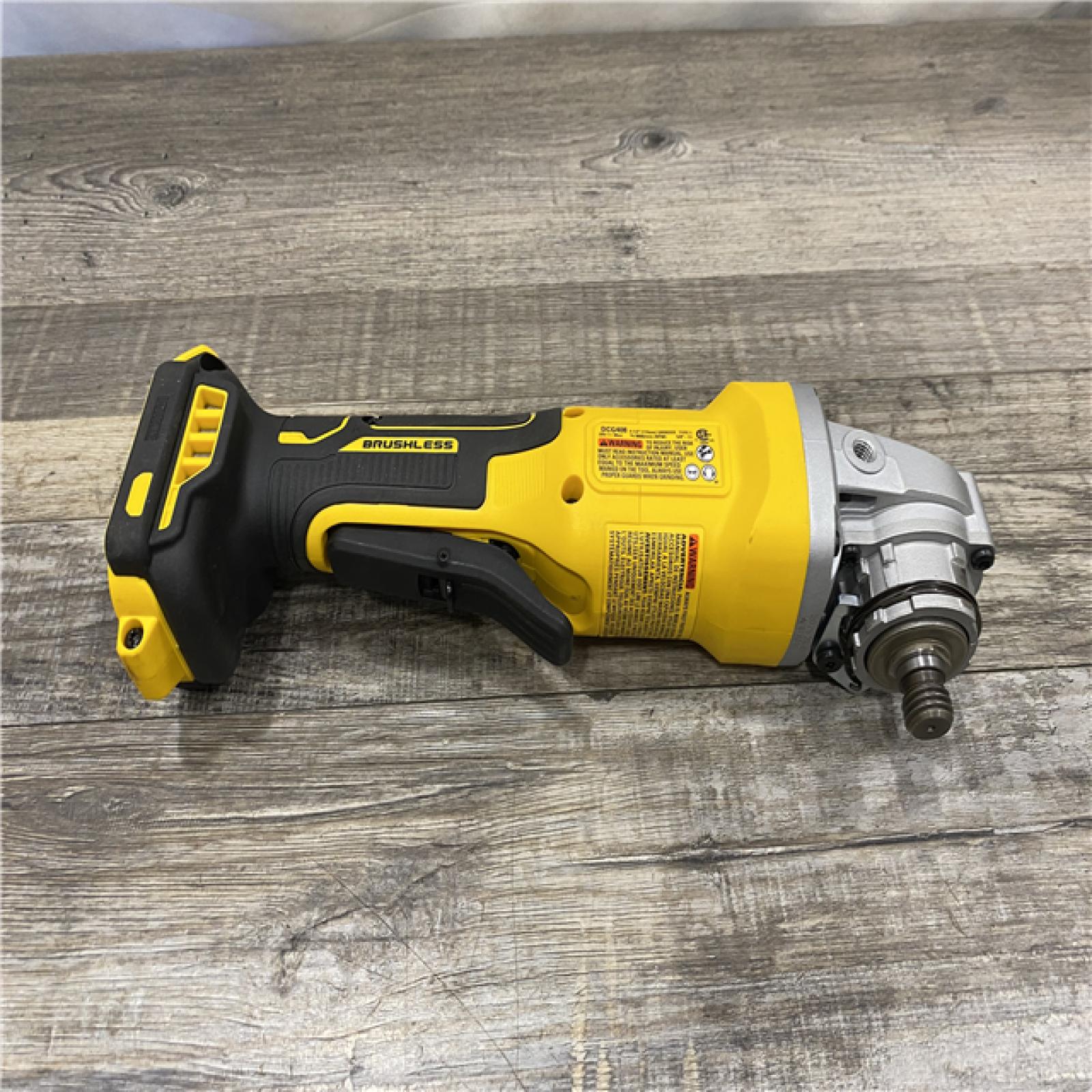 AS-IS DEWALT 20V MAX Cordless Brushless 4-1/2 in. Angle Grinder with Paddle Switch (Tool Only)