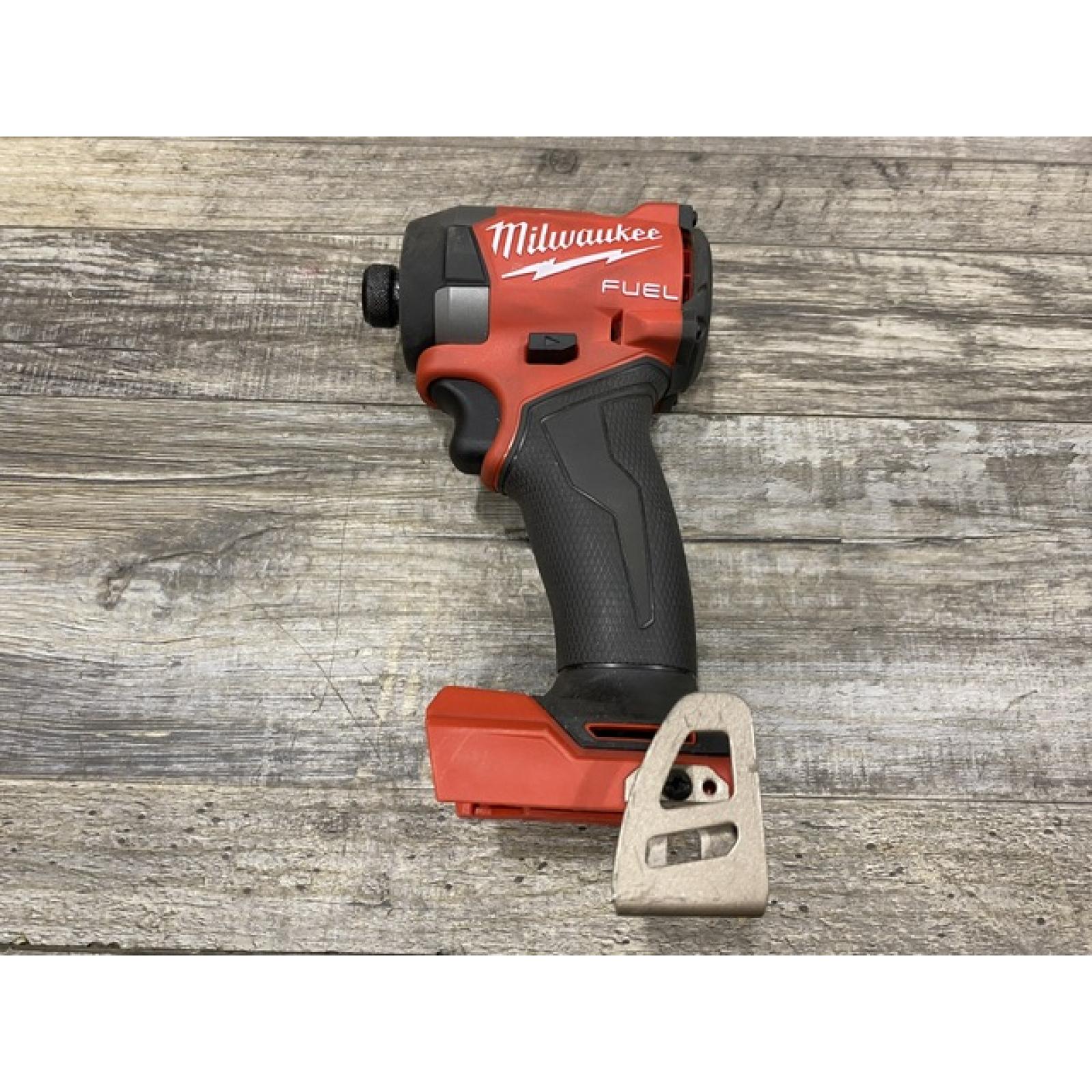 AS-IS Milwaukee FUEL 18V Lithium-Ion Brushless Cordless 1/4 in. Hex Impact Driver (Tool-Only)