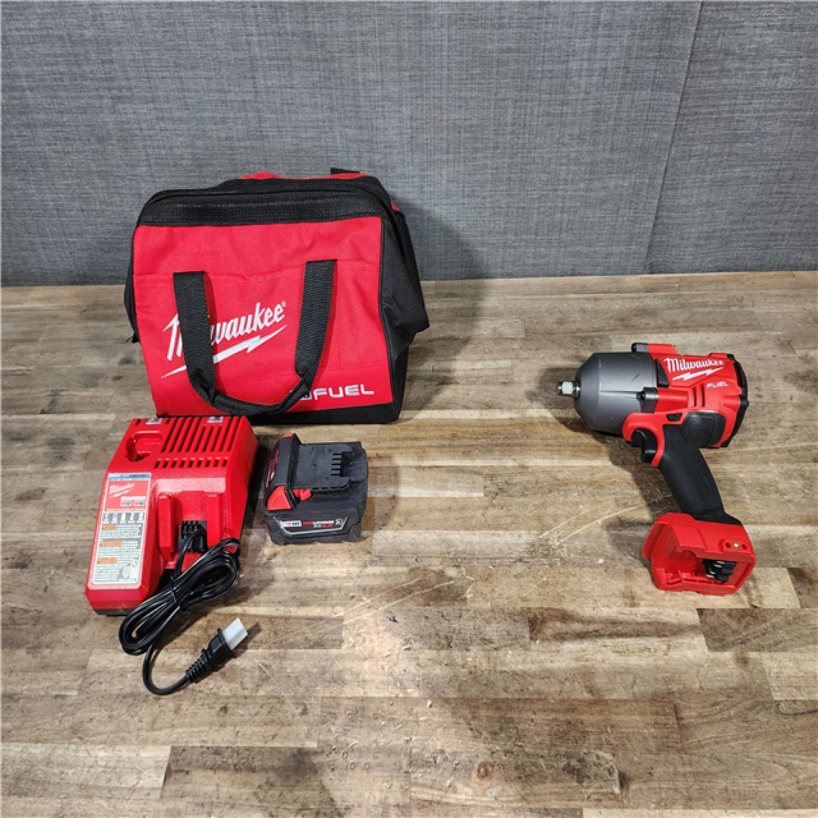HOUSTON LOCATION - AS-IS Milwaukee M18 FUEL 18-Volt Lithium-Ion Brushless Cordless 1/2 in. Impact Wrench with Friction Ring W/ BATTERY & CHARGER