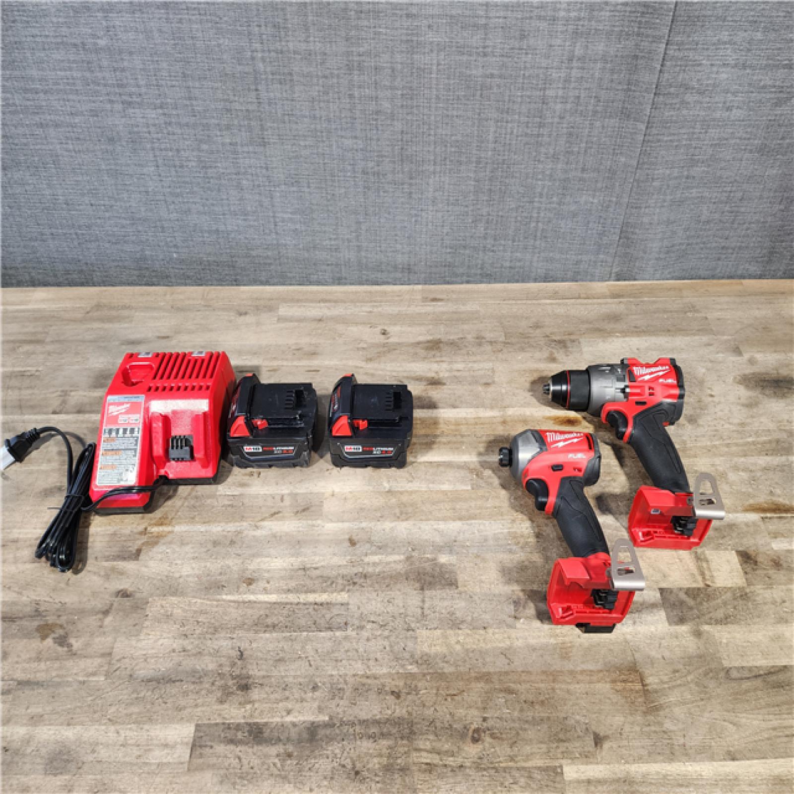 HOUSTON LOCATION - AS-IS Milwaukee 2 Tool Combo Kit W/ (2) Battery & Charger