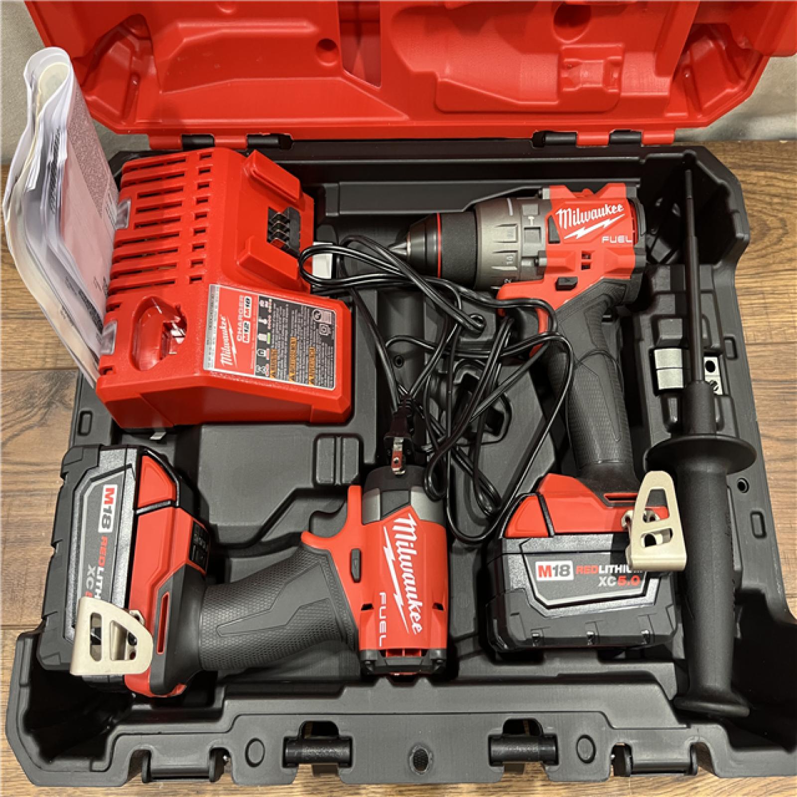 AS-IS M18 FUEL 18V Lithium-Ion Brushless Cordless Hammer Drill and Impact Driver Combo Kit (2-Tool) with 2 Batteries